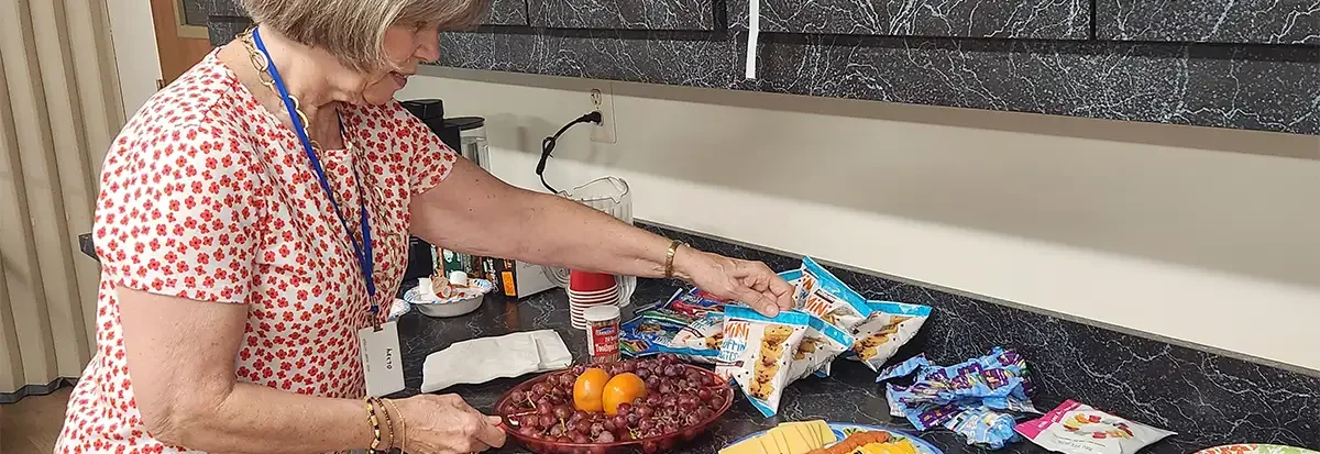 woman arranging snacks