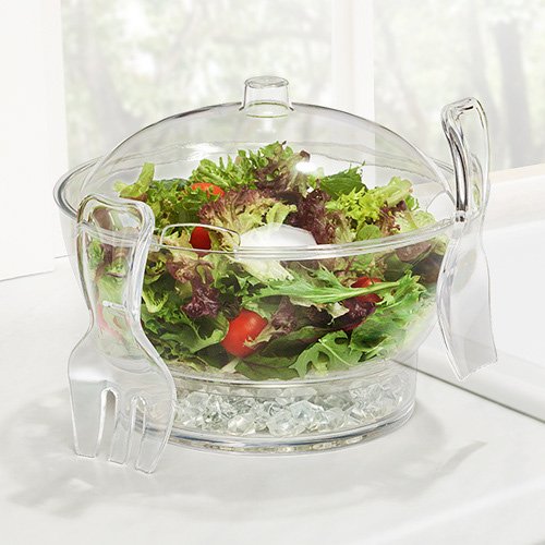 Glass bowl of mixed salad with lettuce and cherry tomatoes on a glass stand, with a salad fork beside it. Photo composite made by Alexis Kush Creative using stock and product photographs.