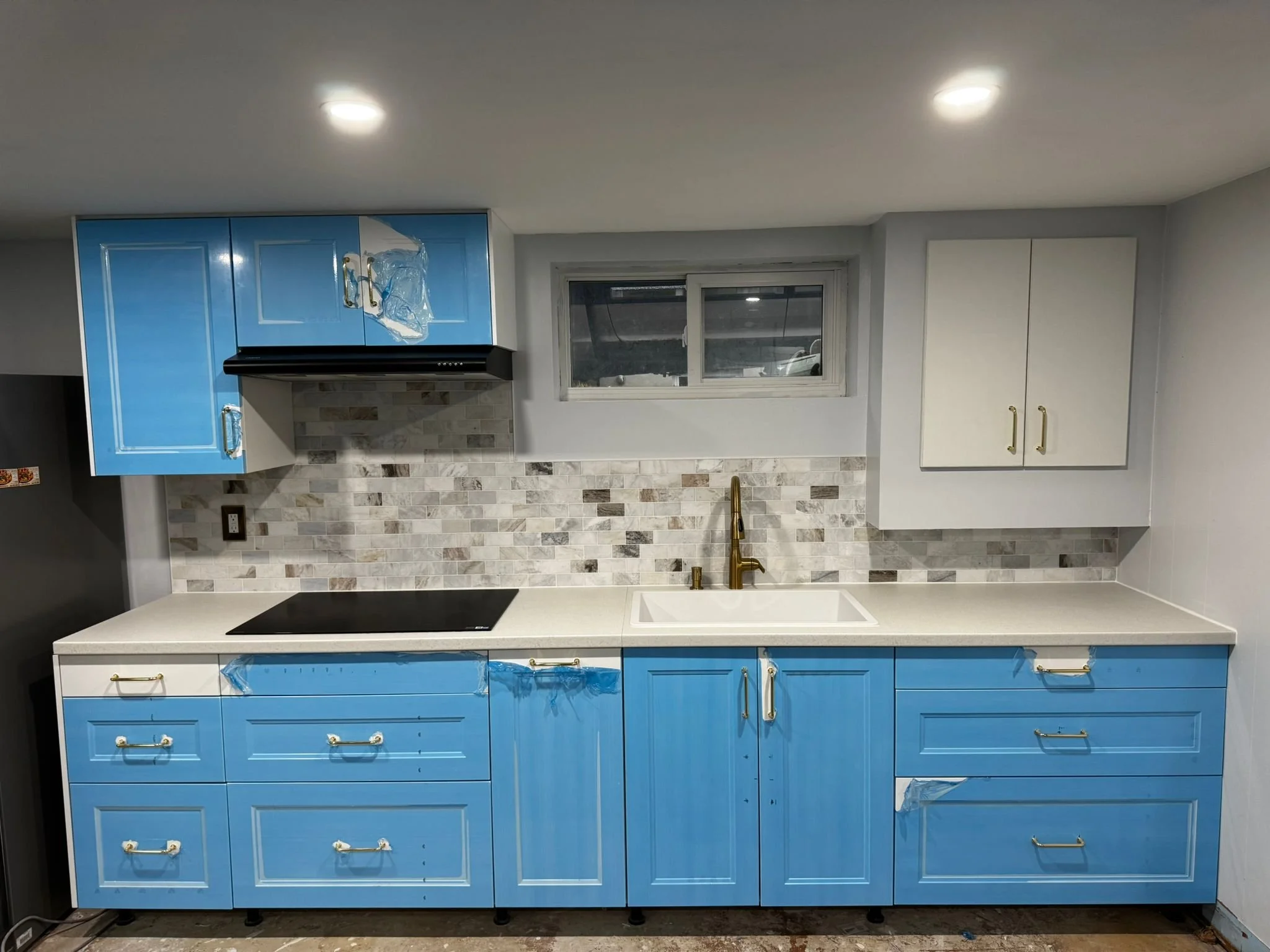White & Gold Basement Kitchen