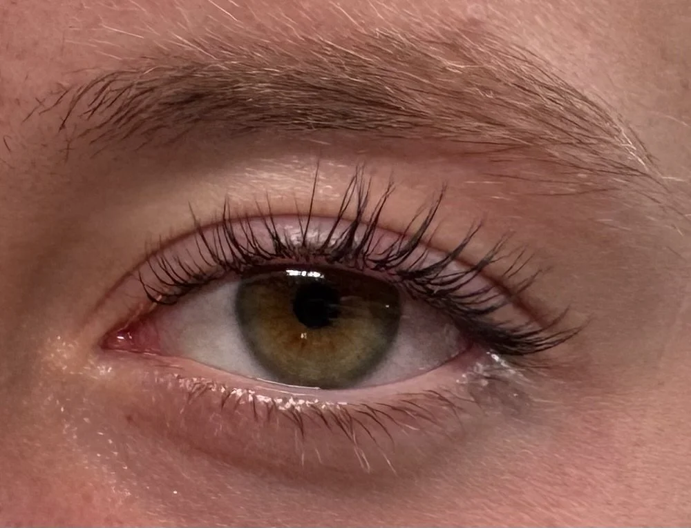 Close-up of a human eye with a lash lift.
