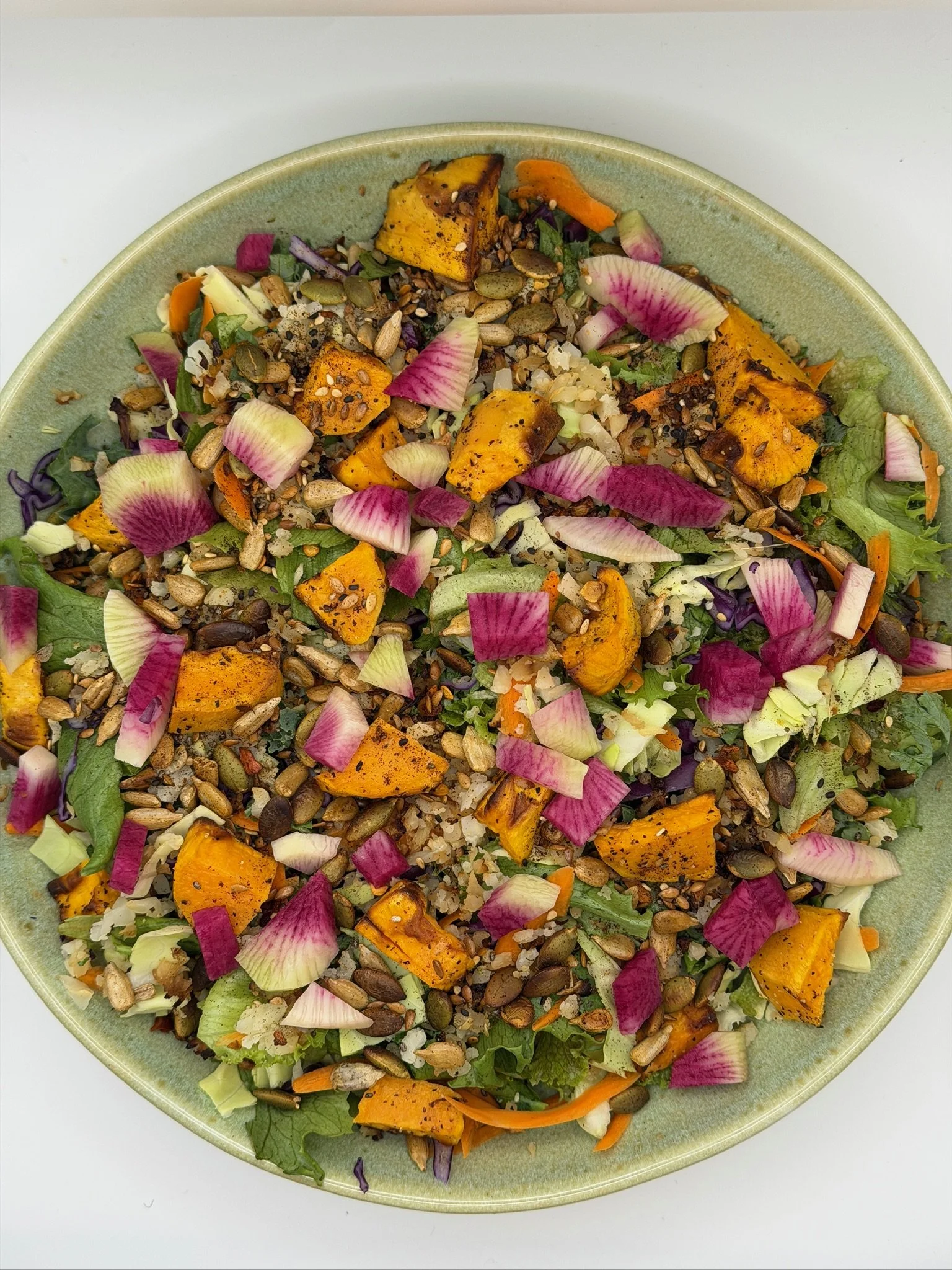 Mixed greens salad with watermelon radish.jpg