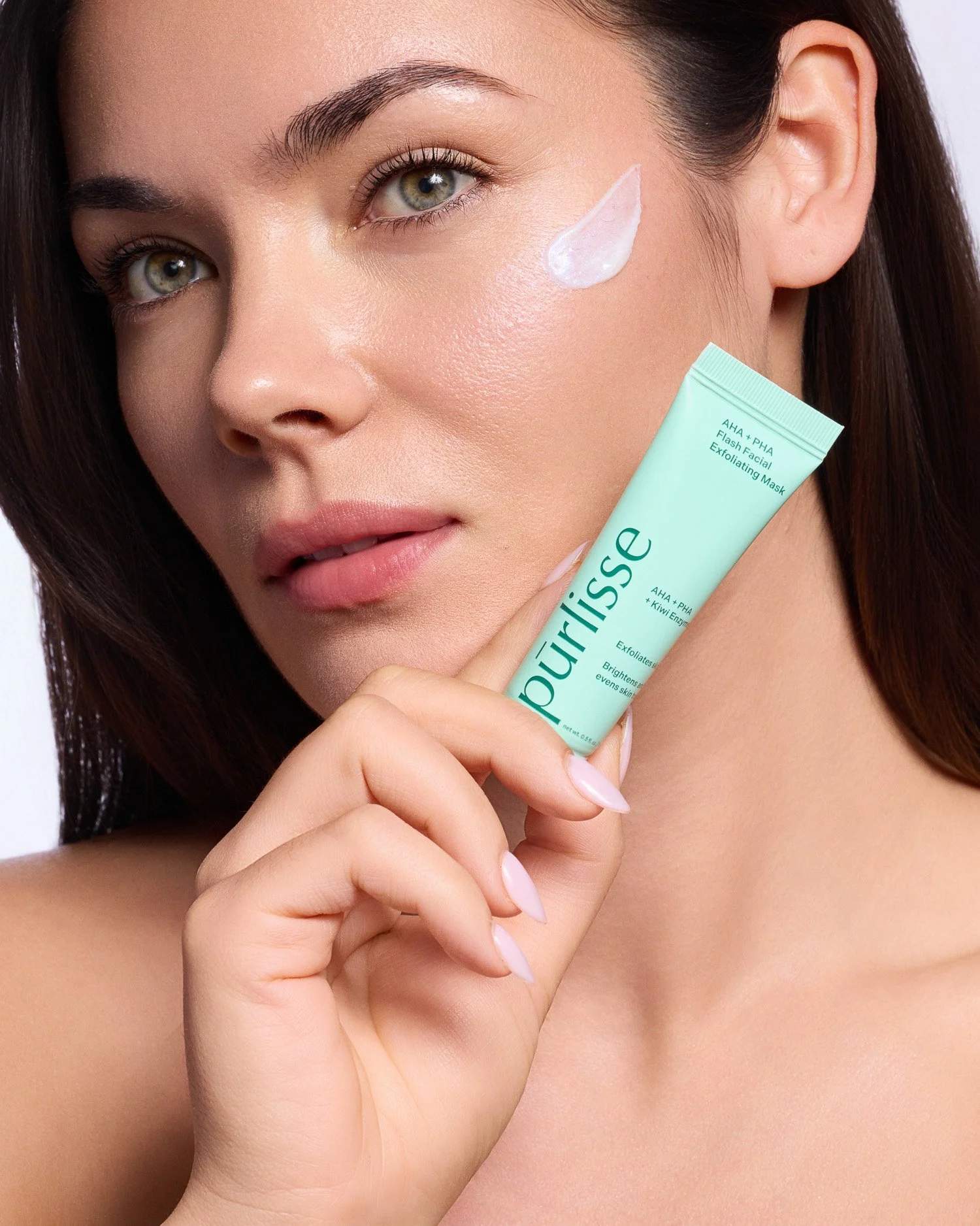 Studio skincare content with cream application and turquoise PurLisse tube