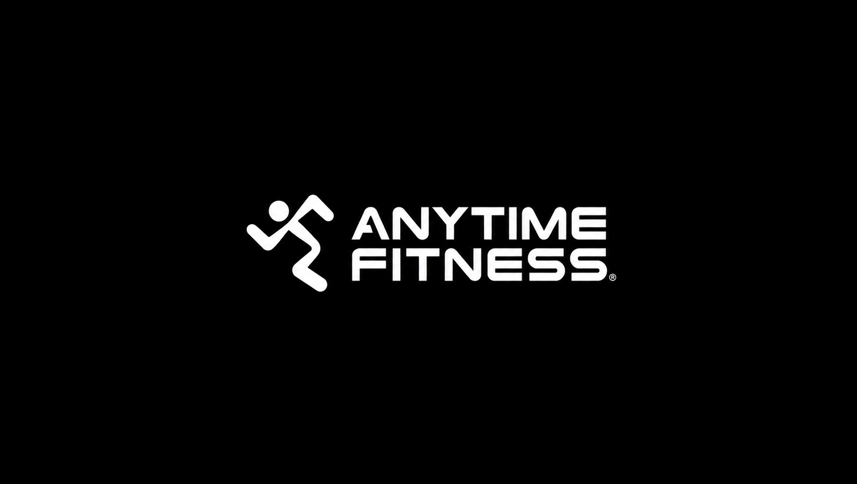 Black background with a white logo of a stylized running person and the text "Anytime Fitness" in bold, uppercase letters.