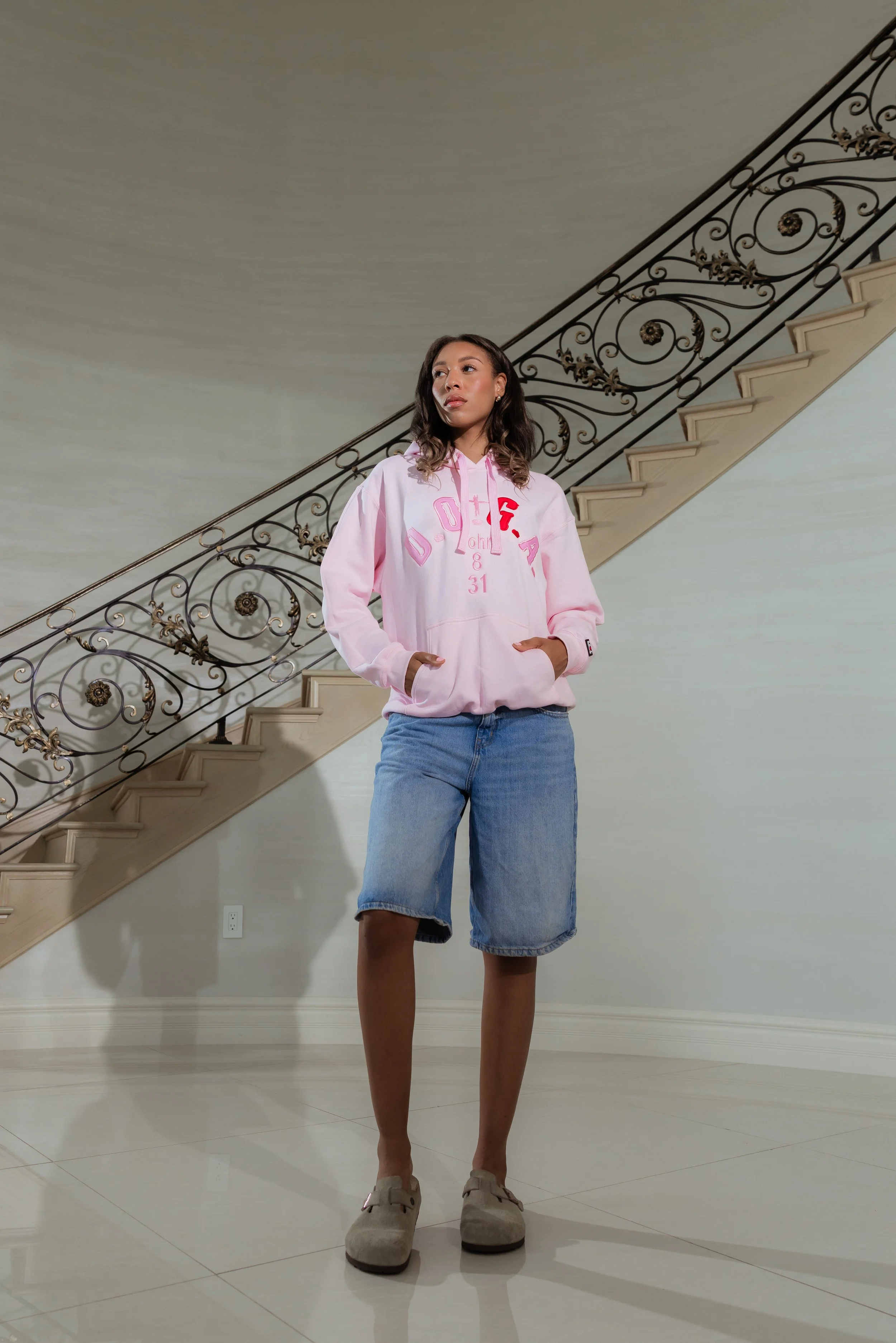 A pink D.O.G.A. disciples of God's army hoodie.