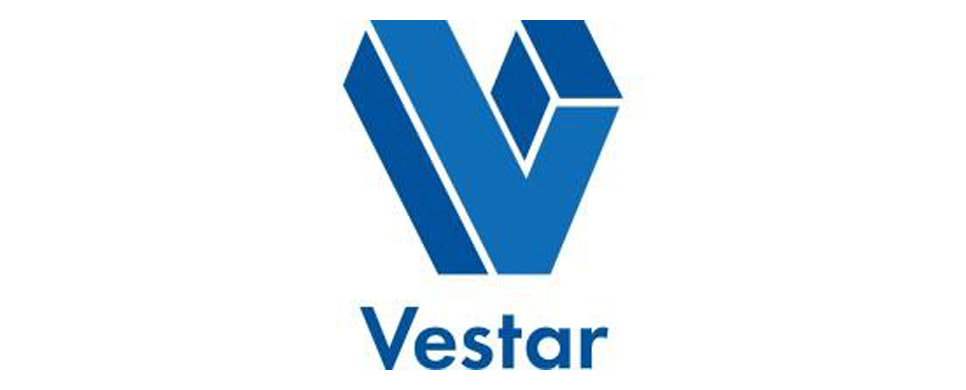 Vestar logo featuring a blue geometric hexagon shape with the word 'Vestar' underneath.
