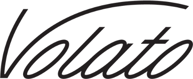 Close-up of a black logo with the word 'Volato' written in elegant script font.