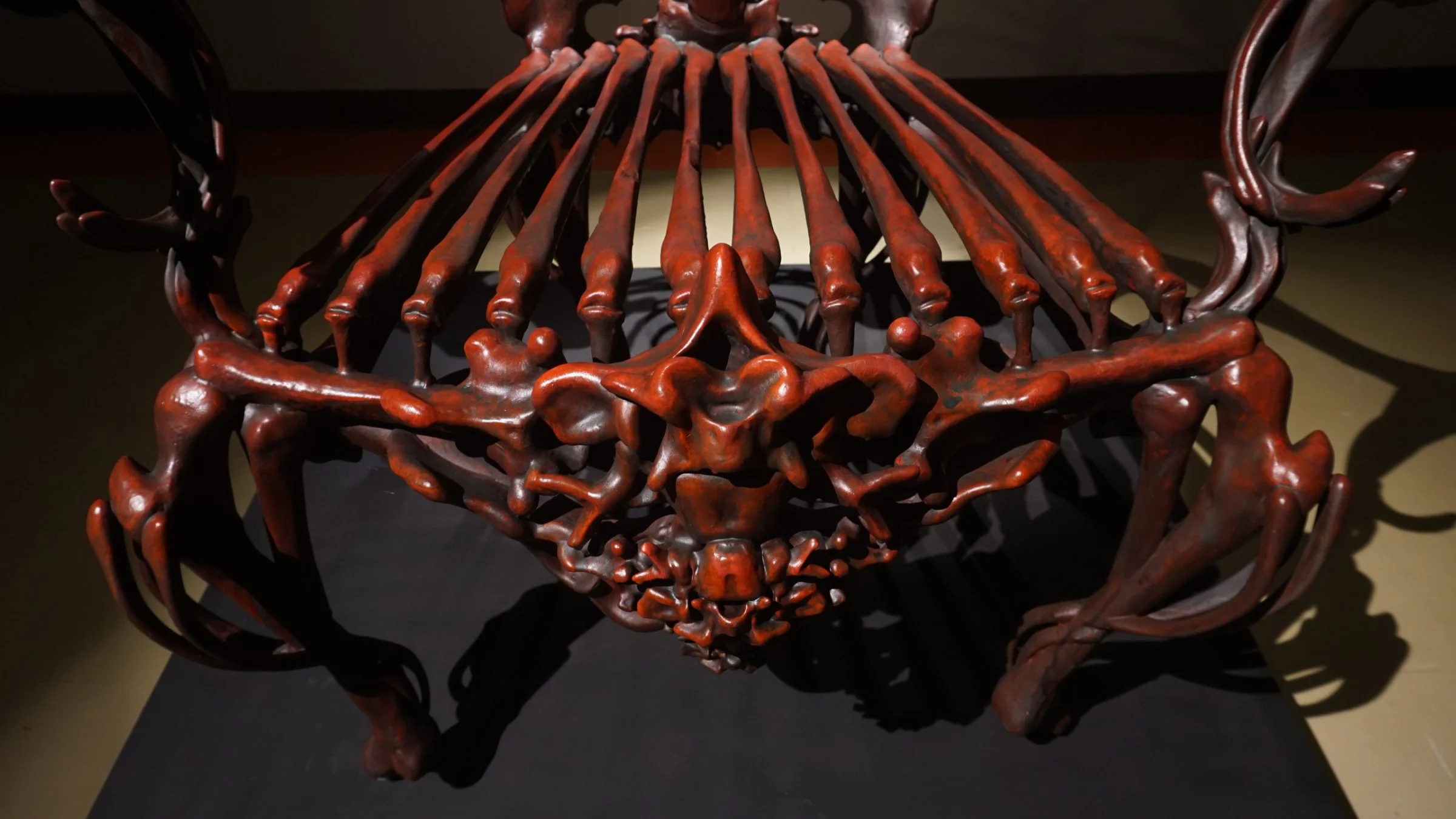 Detail view of Bloody Chair by Ratthakorn Disjaiyen - Red hand-painted acrylic on fiberglass resin