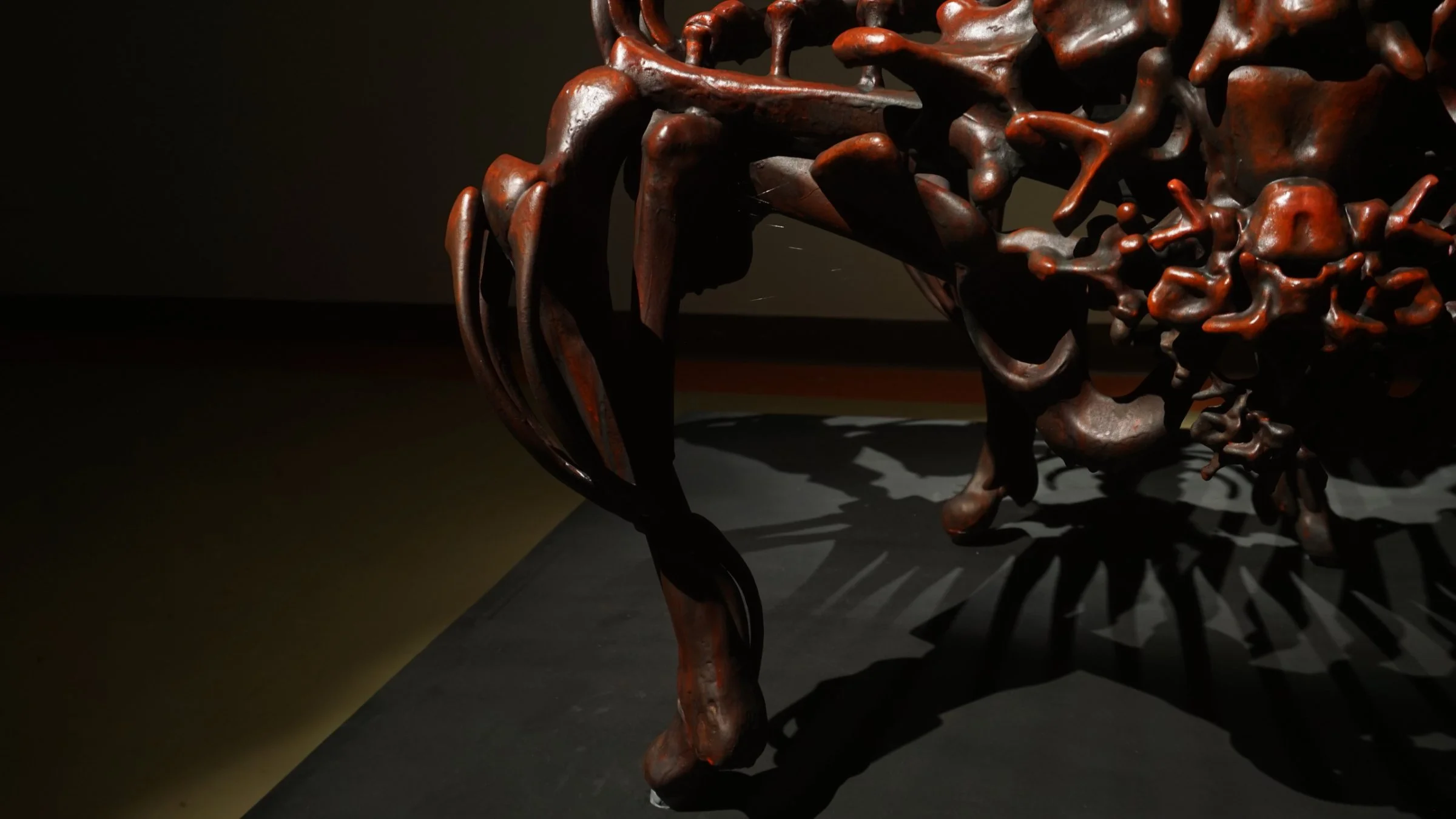 Detail view of Bloody Chair by Ratthakorn Disjaiyen - Red hand-painted acrylic on fiberglass resin