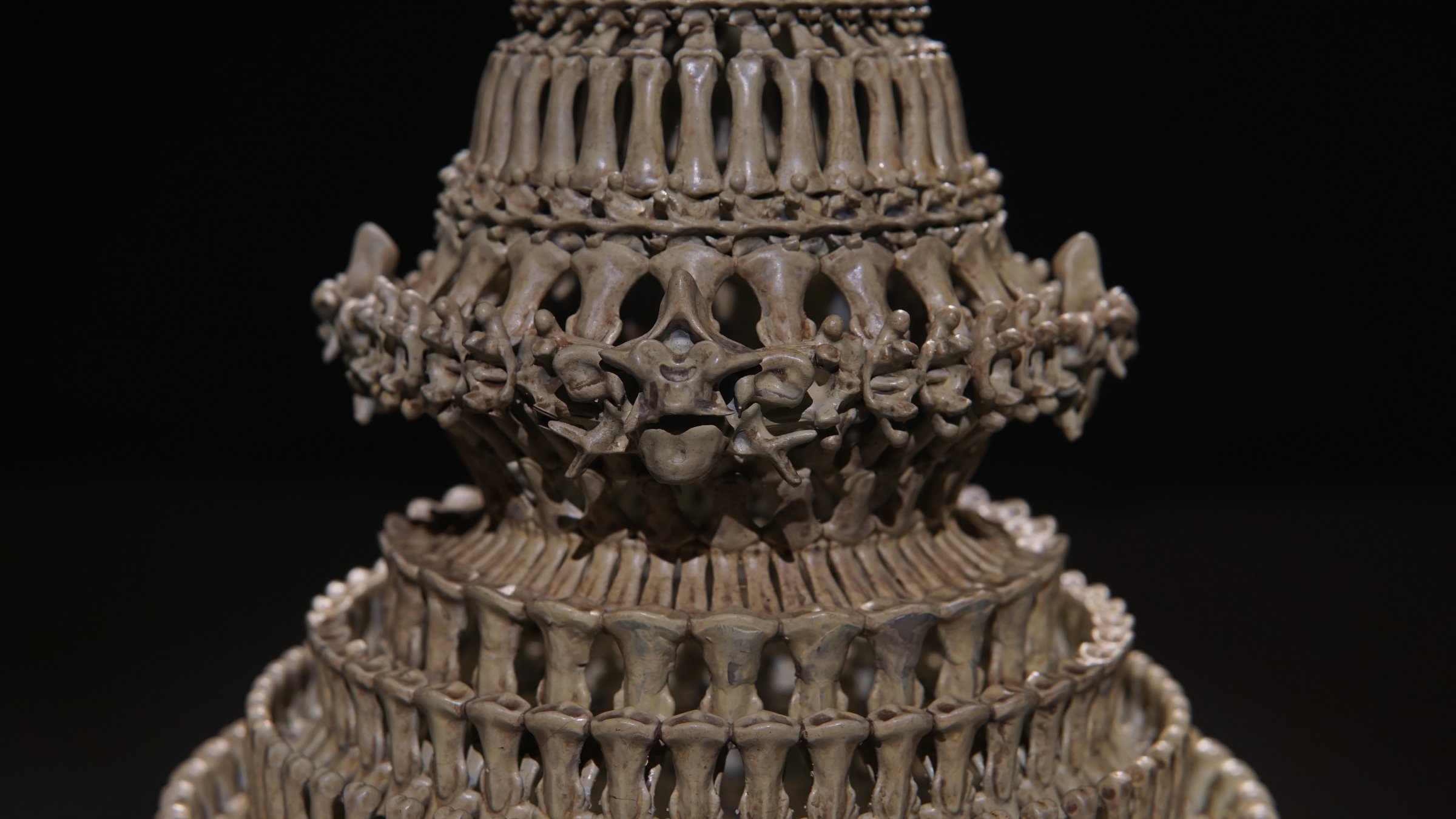Crown of Bones sculpture by Ratthakorn Disjaiyen - A Thai Chada headdress made of bones exploring power and death.