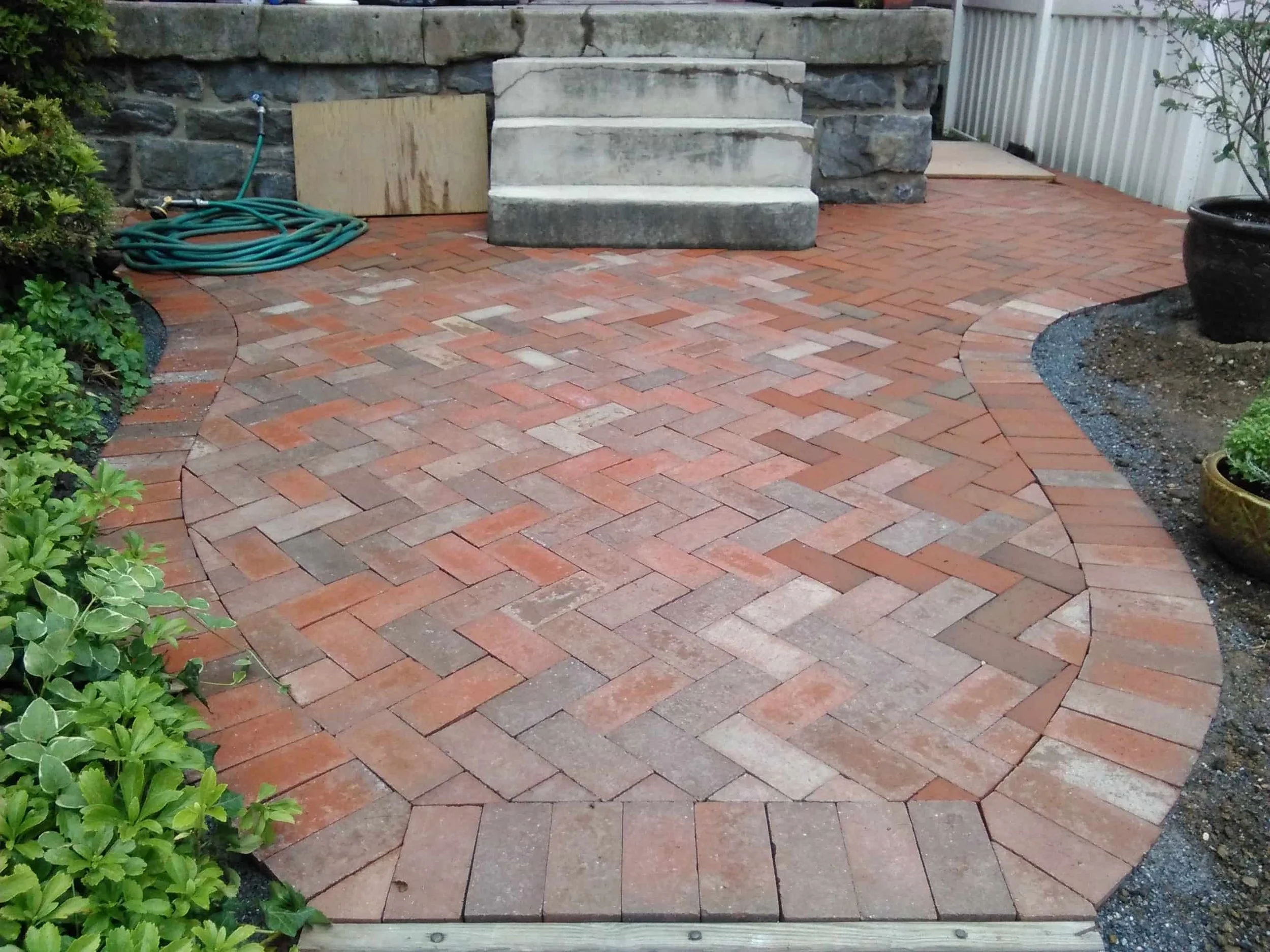 Hardscape Brick Patio. Herringbone on a 45. Stone Wall Restoration.  Lancaster P.A.