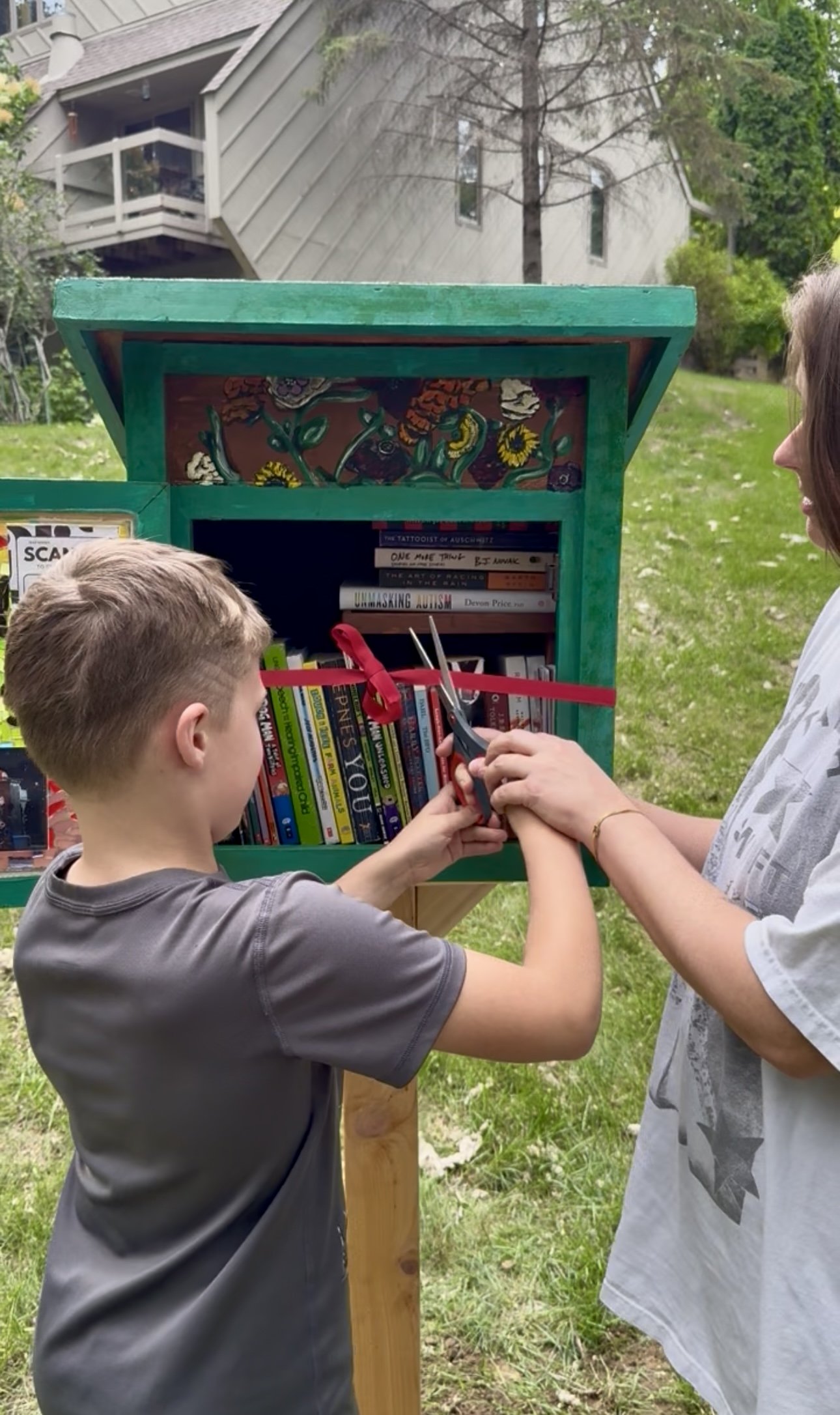 Here's my son and I cutting the ribbon on June 24, 2025