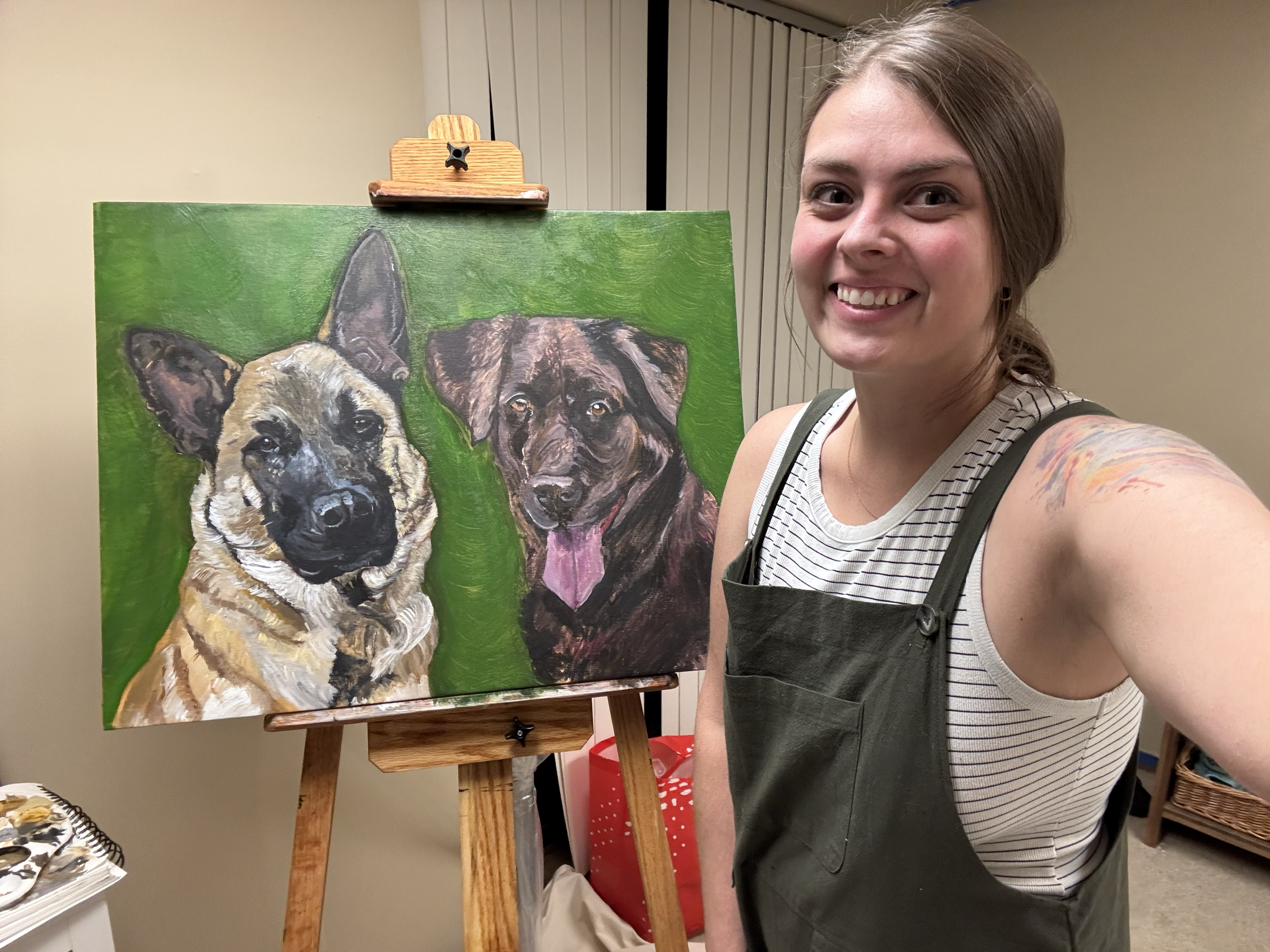 Cynthia with the in progress painting. June 15, 2025