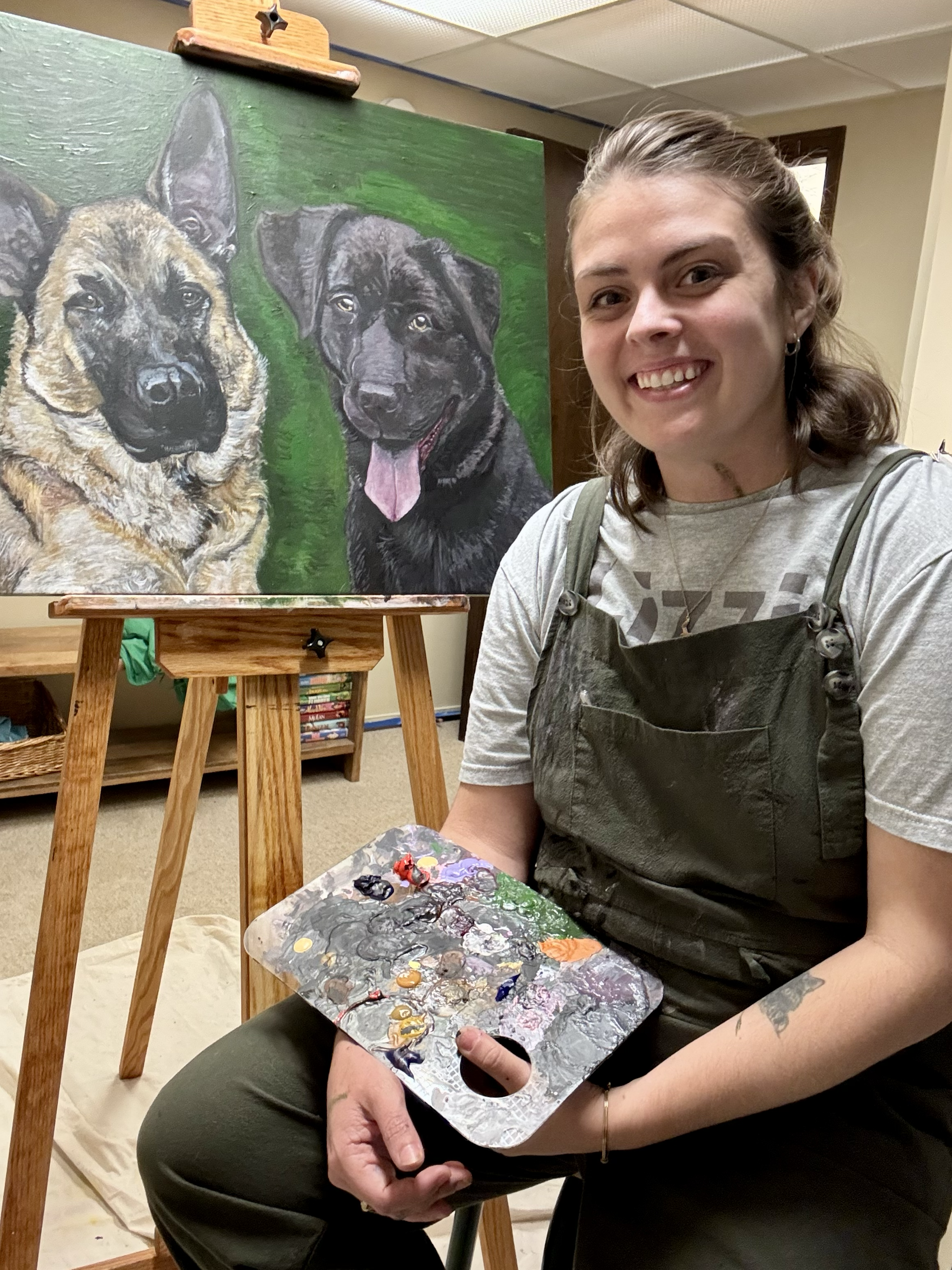 Same as the photo before... except Cynthia is holding a paint palette.