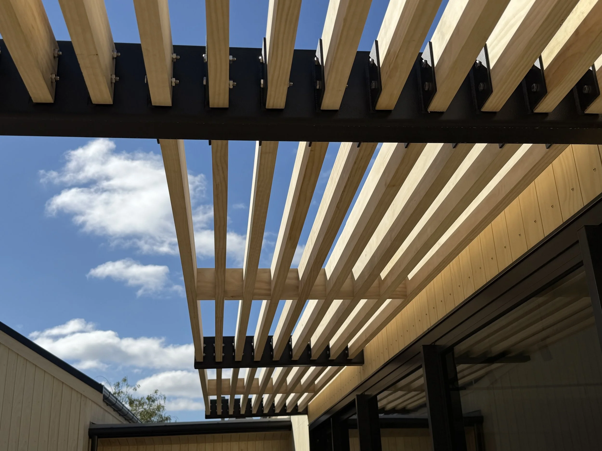 Image showing passive design solutions against the harsh Central Otago Sun. . Designed by the team at Candela Architecture working across Queenstown, Wanaka, Cromwell, Alexandra, and Invercargill.