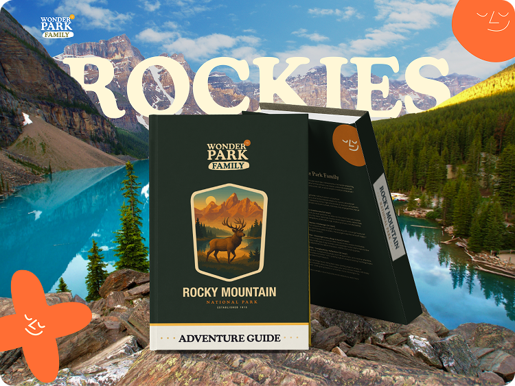 An adventure guide for Rocky Mountain National Park from Wonder Park Family, set outdoors with mountains, a lake, and trees in the background, and featuring a black cover with an illustration of a mountain and a deer.