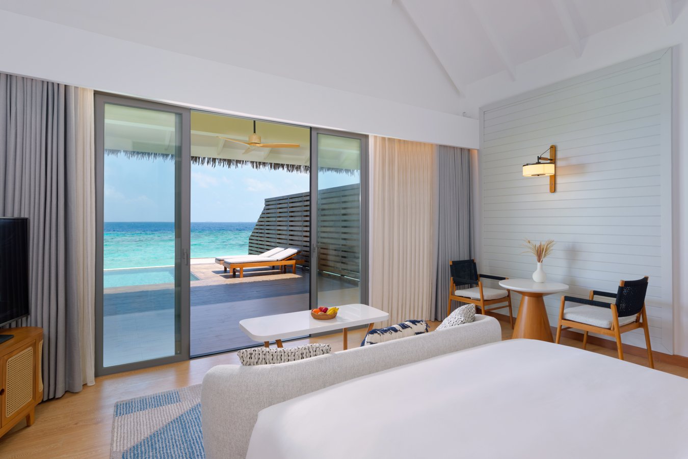 dusitd2-feydhoo-maldives-accommodation-waterfront-pool-villa-bedroom-pool-1350x900.jpg