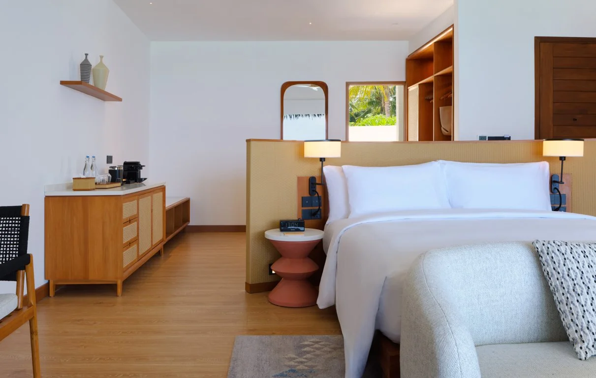dusitd2-feydhoo-maldives-accommodation-waterfront-pool-villa-bedroom-1211x767.jpg