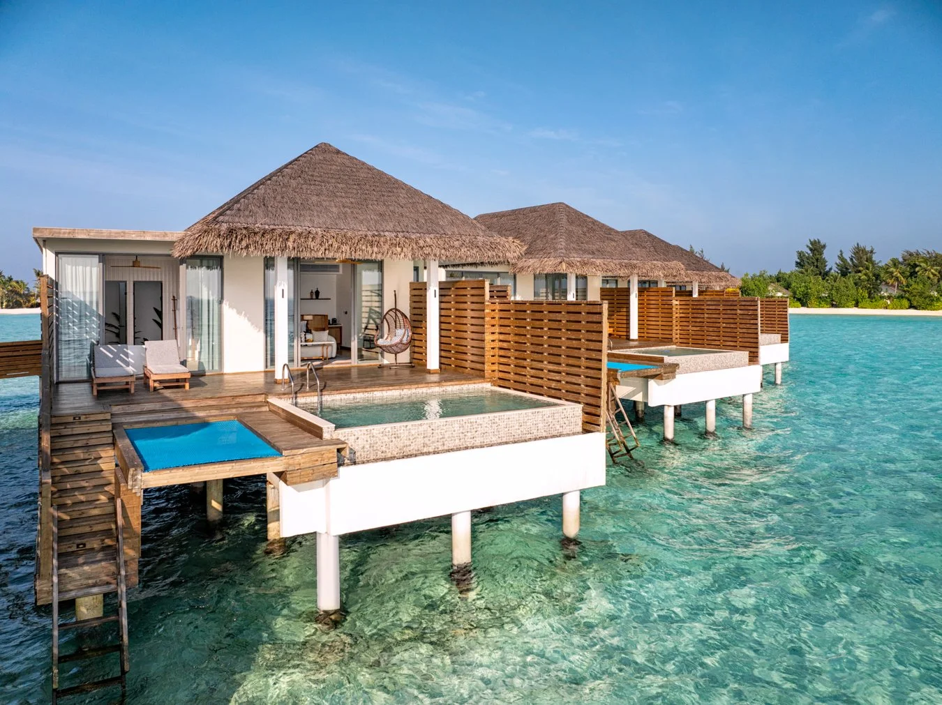 dusitd2-feydhoo-maldives-accommodation-overwater-pool-villa-exterior-overview-1350x1011.jpg