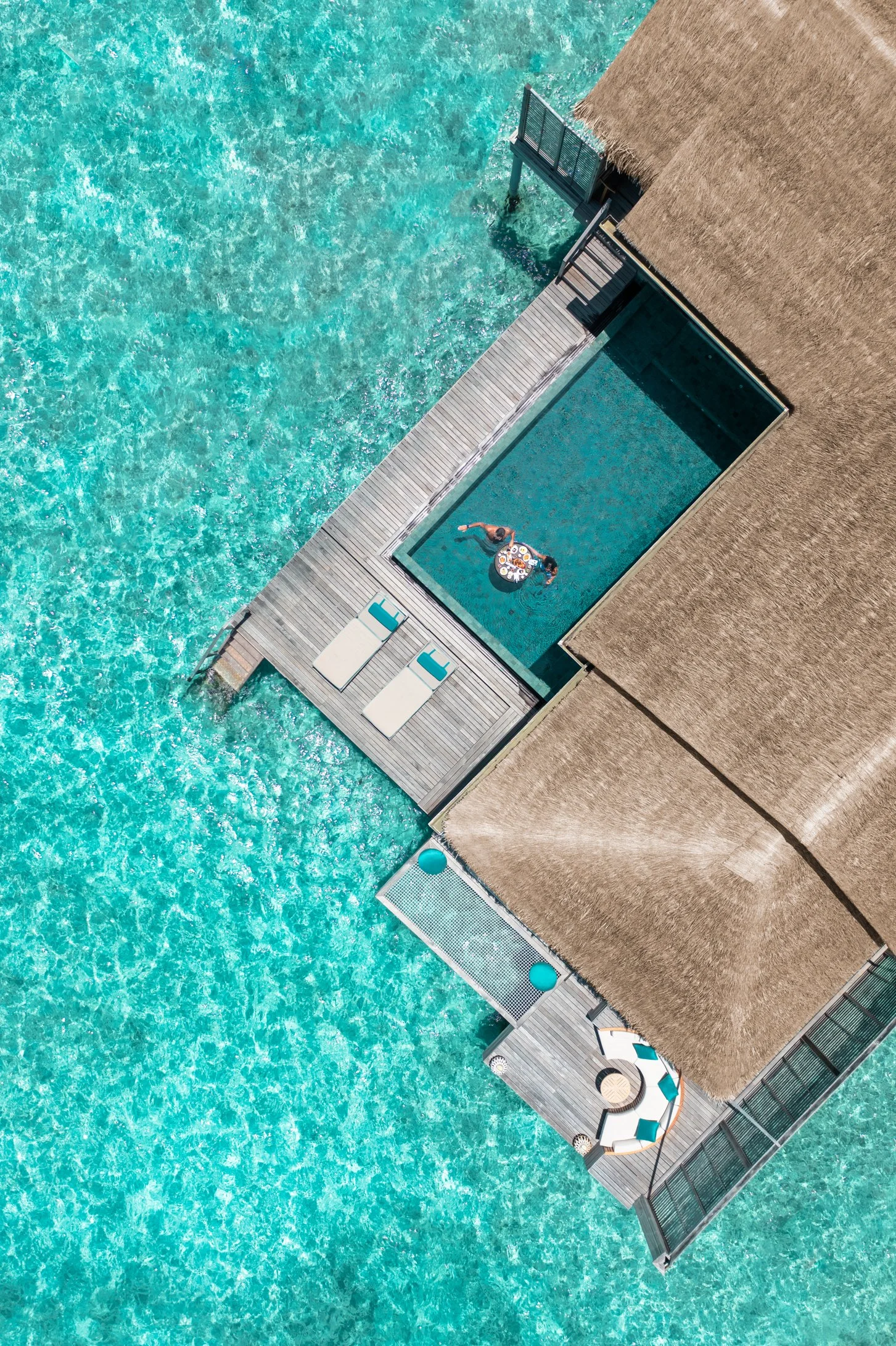 Anantara Kihavah - Over Water Pool Villa Deck and Pool-1453x2182.jpg