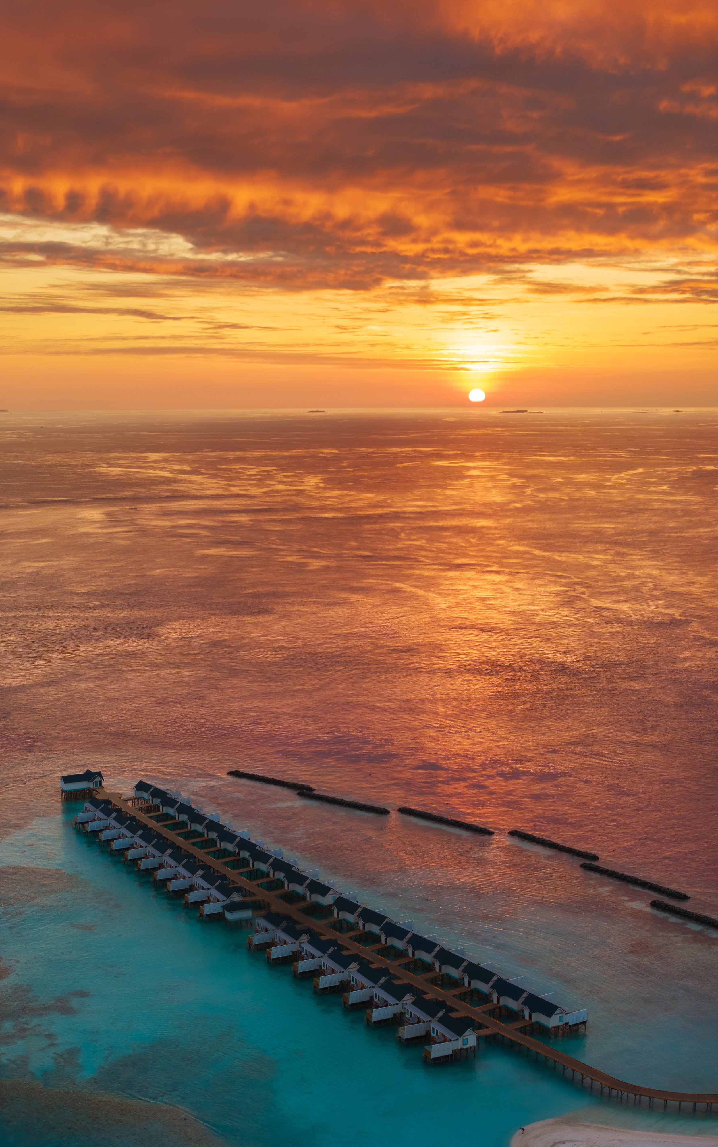 OBLU NATURE Helengeli by SENTIDO - Water Villa with Pool - Sunset Aerial 14.jpg