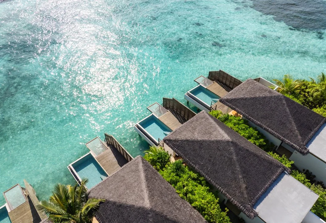 dusitd2-feydhoo-maldives-water-front-villas-exterior-view-with-ocean-1054x723.jpg