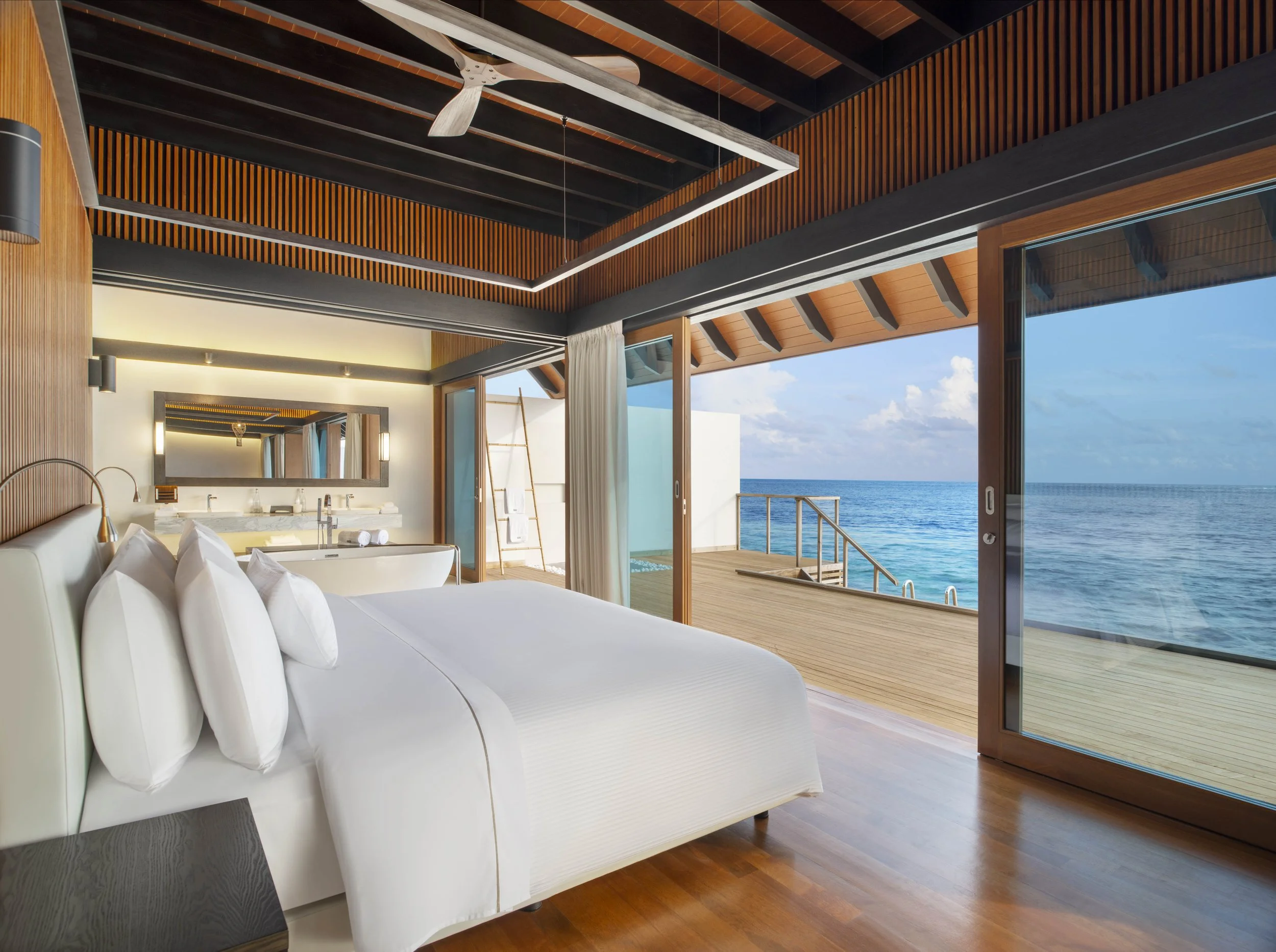 Westin Maldives - Overwater Villa Bedroom.jpg