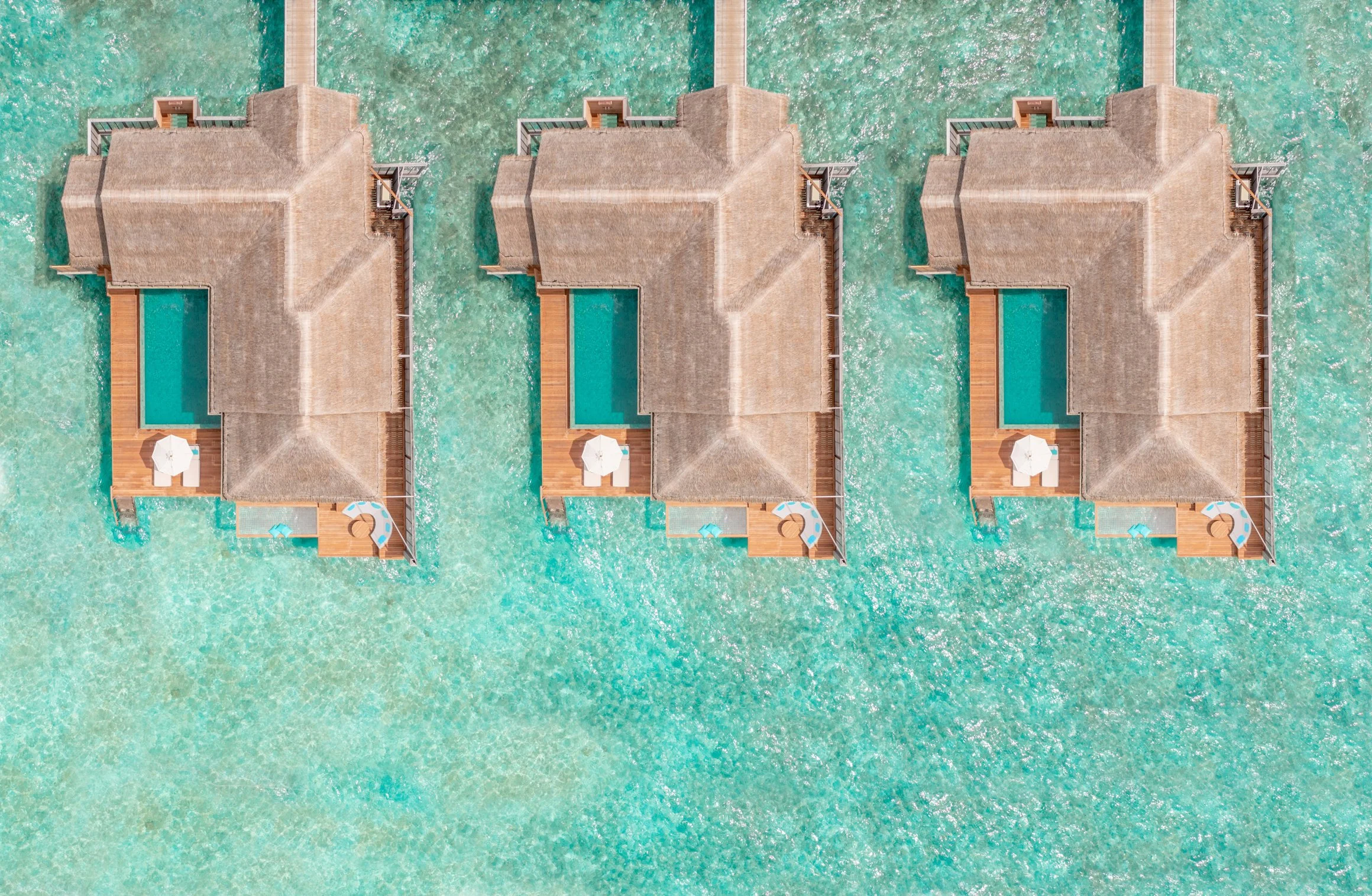 Anantara Kihavah - Aerial Over Water Pool Villas-2320x1516.jpg