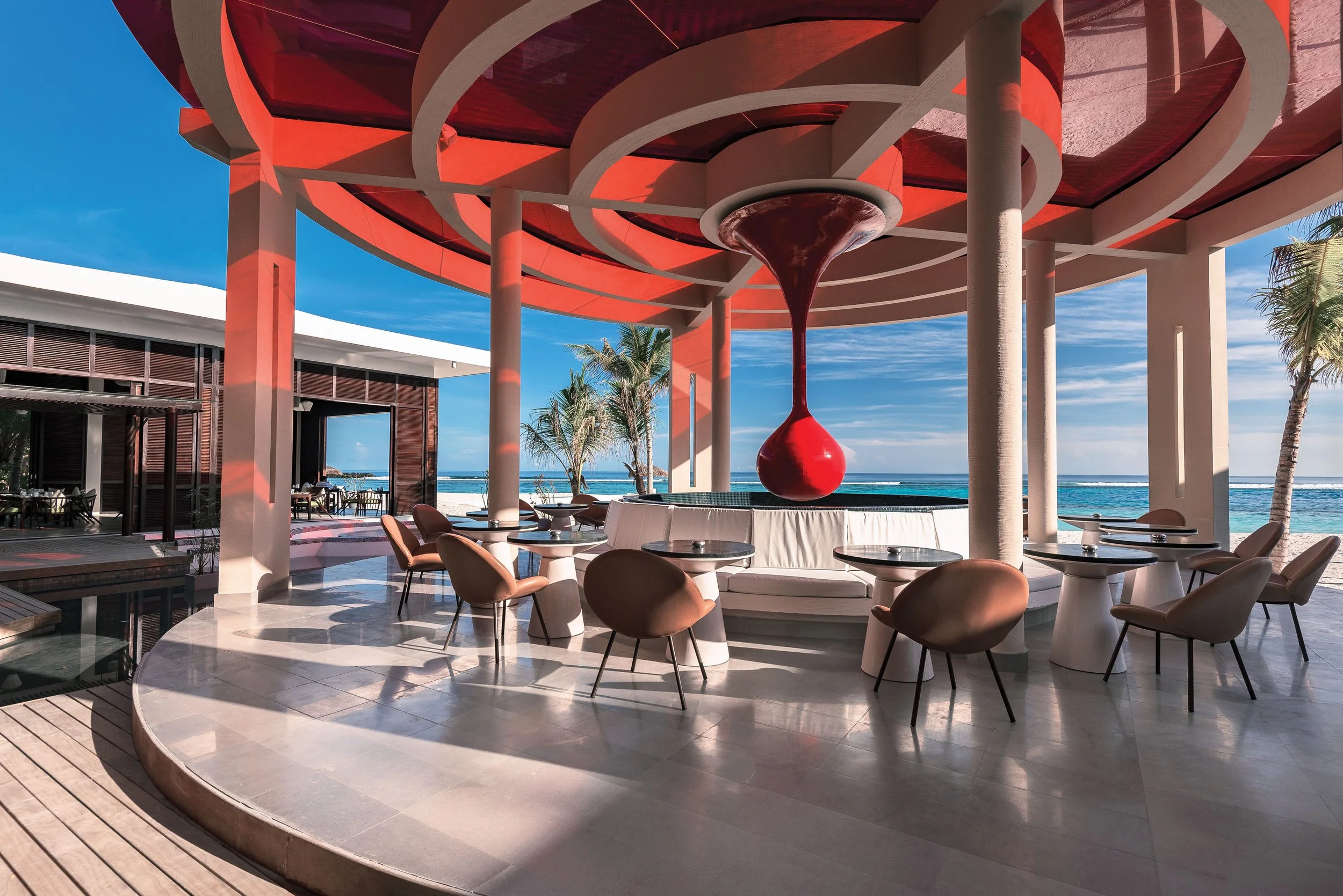 OBLU SELECT SANGELI - OUTLETS AND DINING - The Courtyard Central Seating Area 01 - 07_2018.jpg