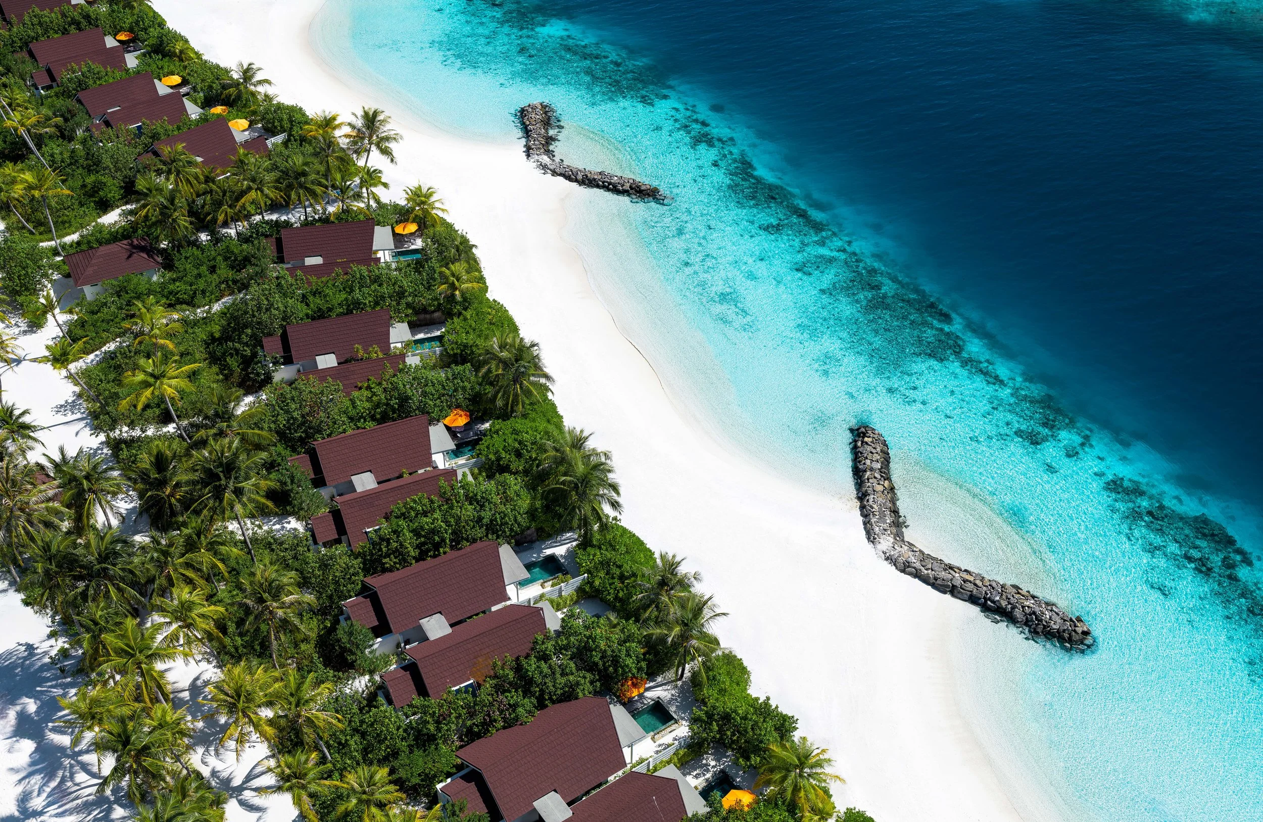 OBLU SELECT Lobigili - Island Aerial - Aerial Beach Villas with Pool.jpg