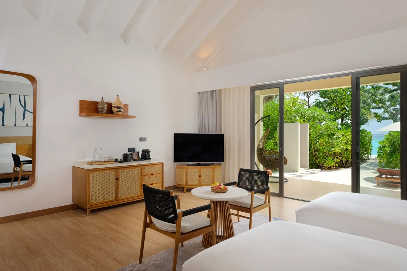 dusitd2-feydhoo-maldives-accommodation-beach-bedroom-twin-beds-1350x900.jpg