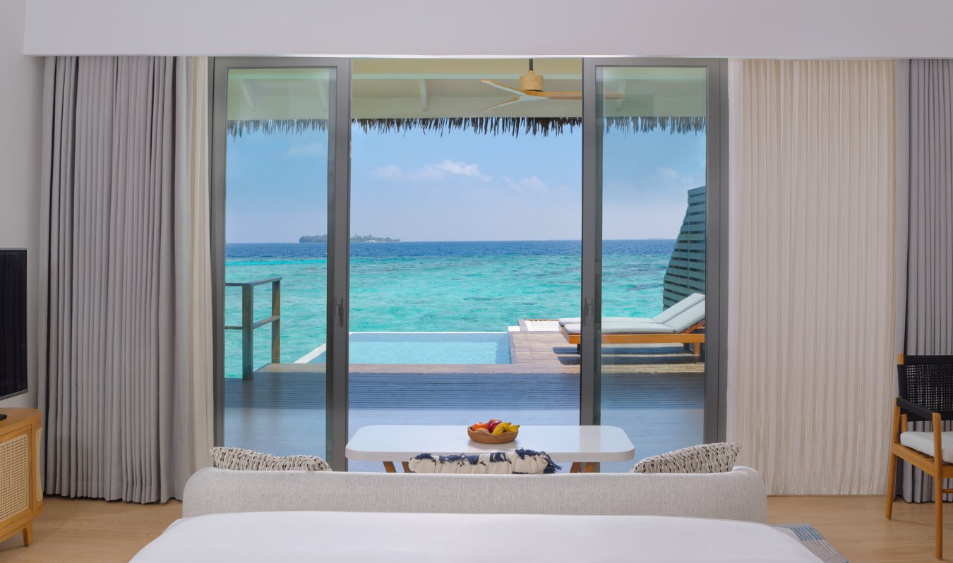 dusitd2-feydhoo-maldives-accommodation-waterfront-pool-villa-bedroom-pool-view-1350x798.jpg
