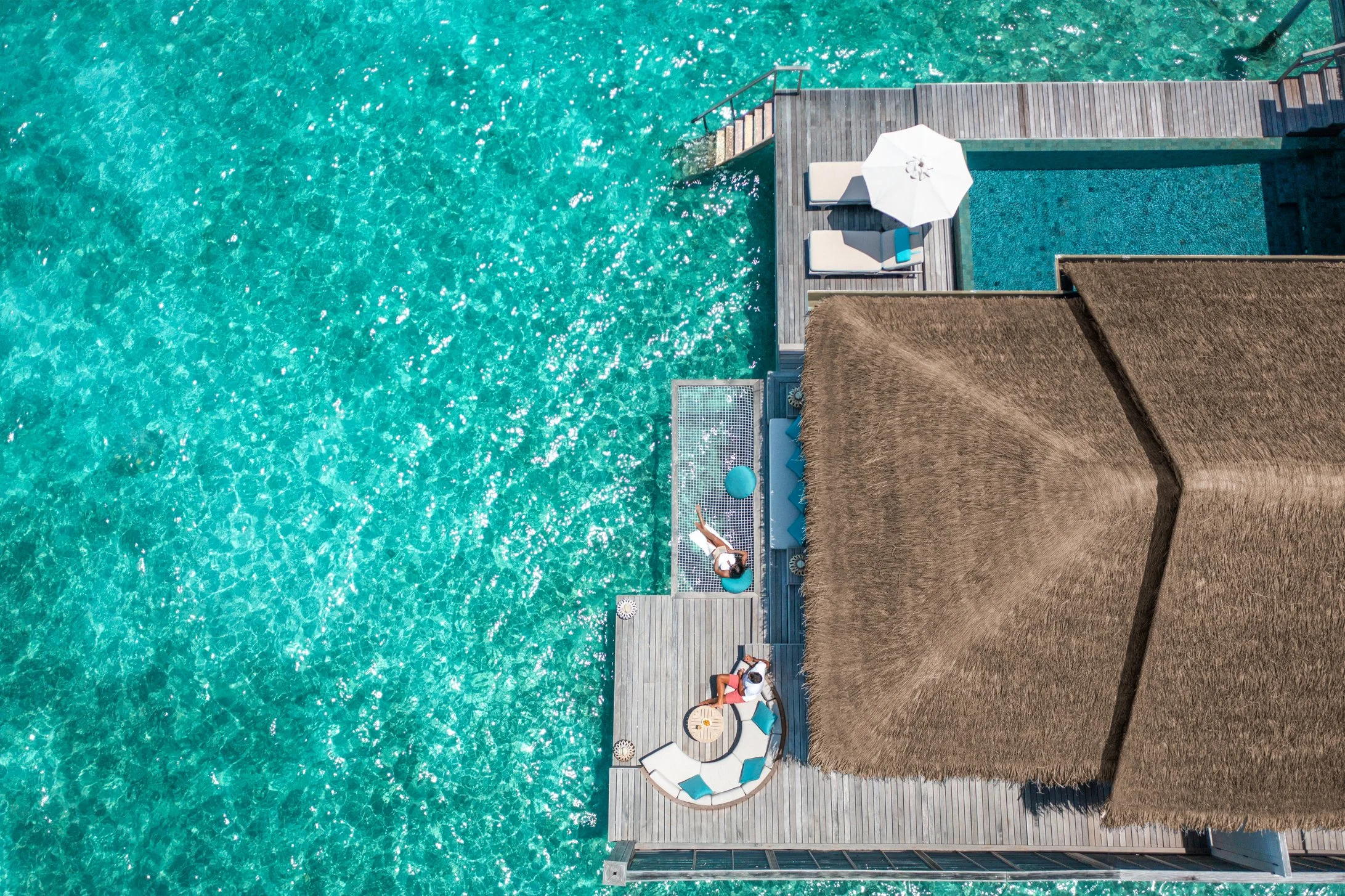 Anantara Kihavah - Over Water Pool Villa Deck & Hammock-2183x1454.jpg