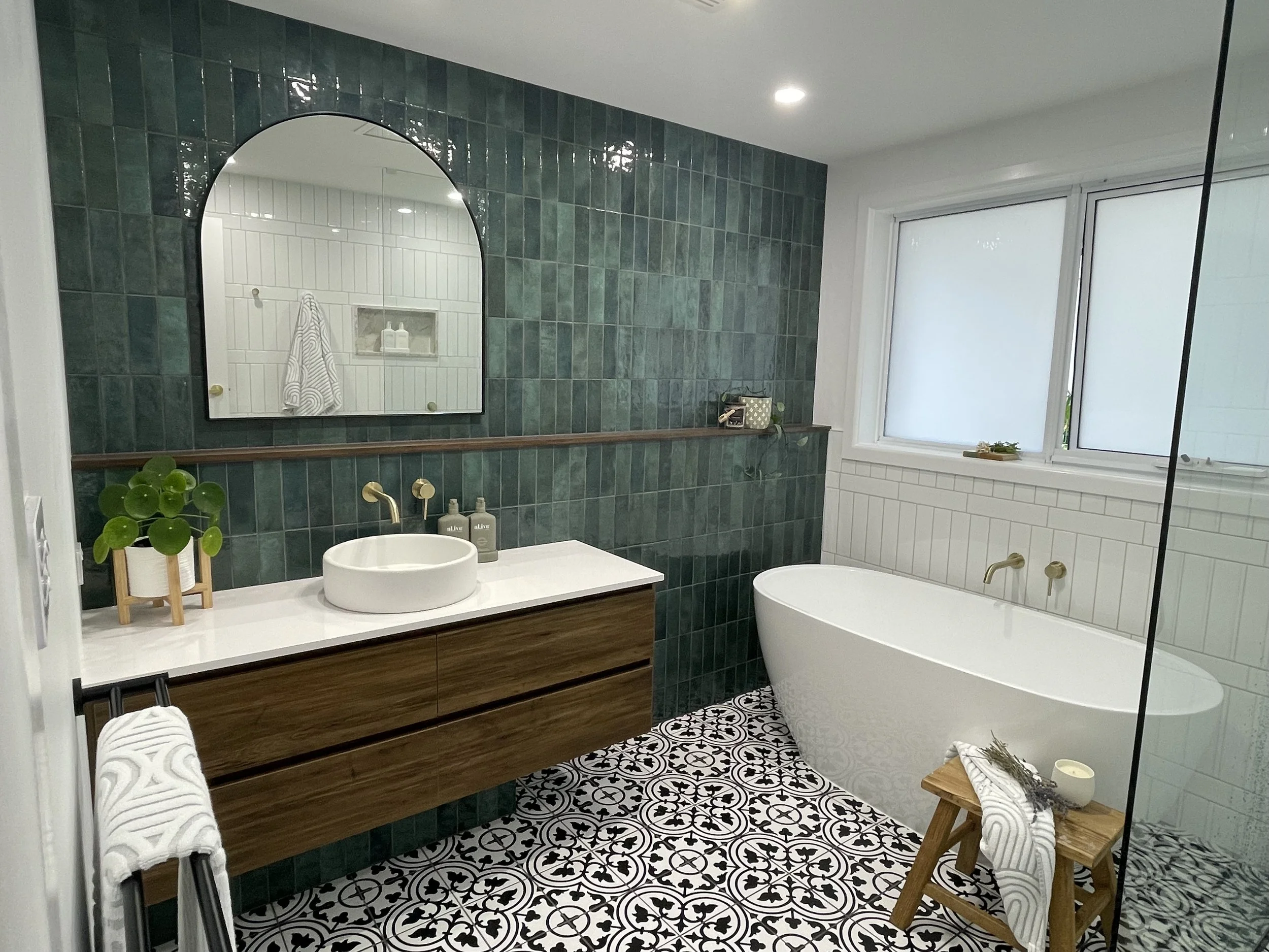 Axiom Cottage Bathroom

Green Tiles - National Tiles Poloma Gloss
Black and White - Rossetto Tiles 
Mirror - RJ Living 
Sink - Nood Co
Tapware - ABI Interiors
Bath - Reece Kado Pettit 
Vanity - Laminex Walnut made to measure
Stone Bench - Silestone
S