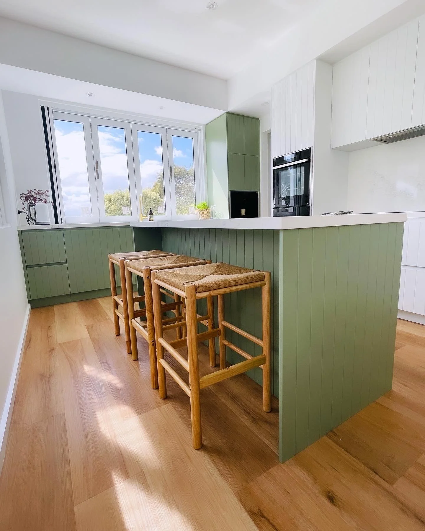Saxon Kitchen

Flooring - Karndean Korlock 'warm ash'
Cabinetry - VJ profile
Laminex Bayleaf
Tap - ABI Interiors
Sink - Turner and Hastings NOVI
Stone - Caeserstone Empire white