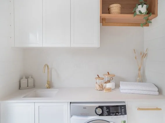 Saxon Laundry

Walls - Easycraft VJ
Tiles - Rosetto
Cabinets - Polytec Blossom White
Stone - Caeserstone Cloudburst Concrete
Handles - Lo and Co
Tap - ABI
Timber box - Polytec Tas oak