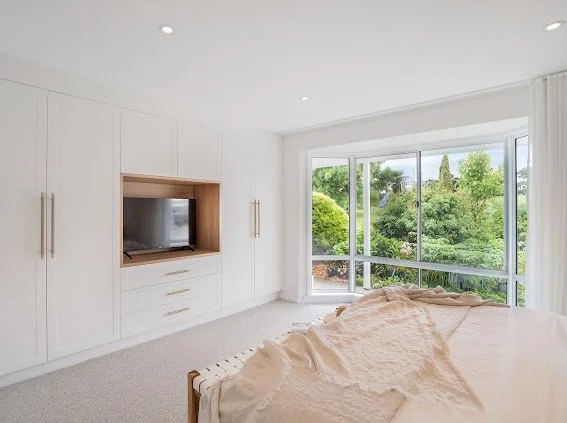 Saxon Master

Cabinetry - Polytec - Blossom White
Insert - Polytec - Tas Oak
Handles - Lo and Co
Carpet - Bremworth  - Ripples 'Ohau"
Bedhead - Adairs
Bench - Living by Design
Sheers - DIY Blinds