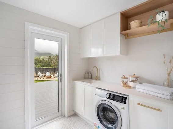 Saxon Laundry

Walls - Easycraft VJ
Tiles - Rosetto
Cabinets - Polytec Blossom White
Stone - Caeserstone Cloudburst Concrete
Handles - Lo and Co
Tap - ABI
Timber box - Polytec Tas oak
