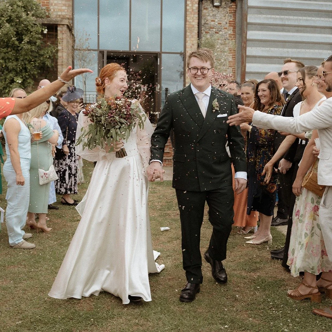 Confetti, one of my favourite shots of the day! everyone smiling at you whilst (sometimes a bit too enthusiastically) throwing petals, paper and love your way. 

And I simply couldn't resist adding in a flare moment.... technically not confetti, but 