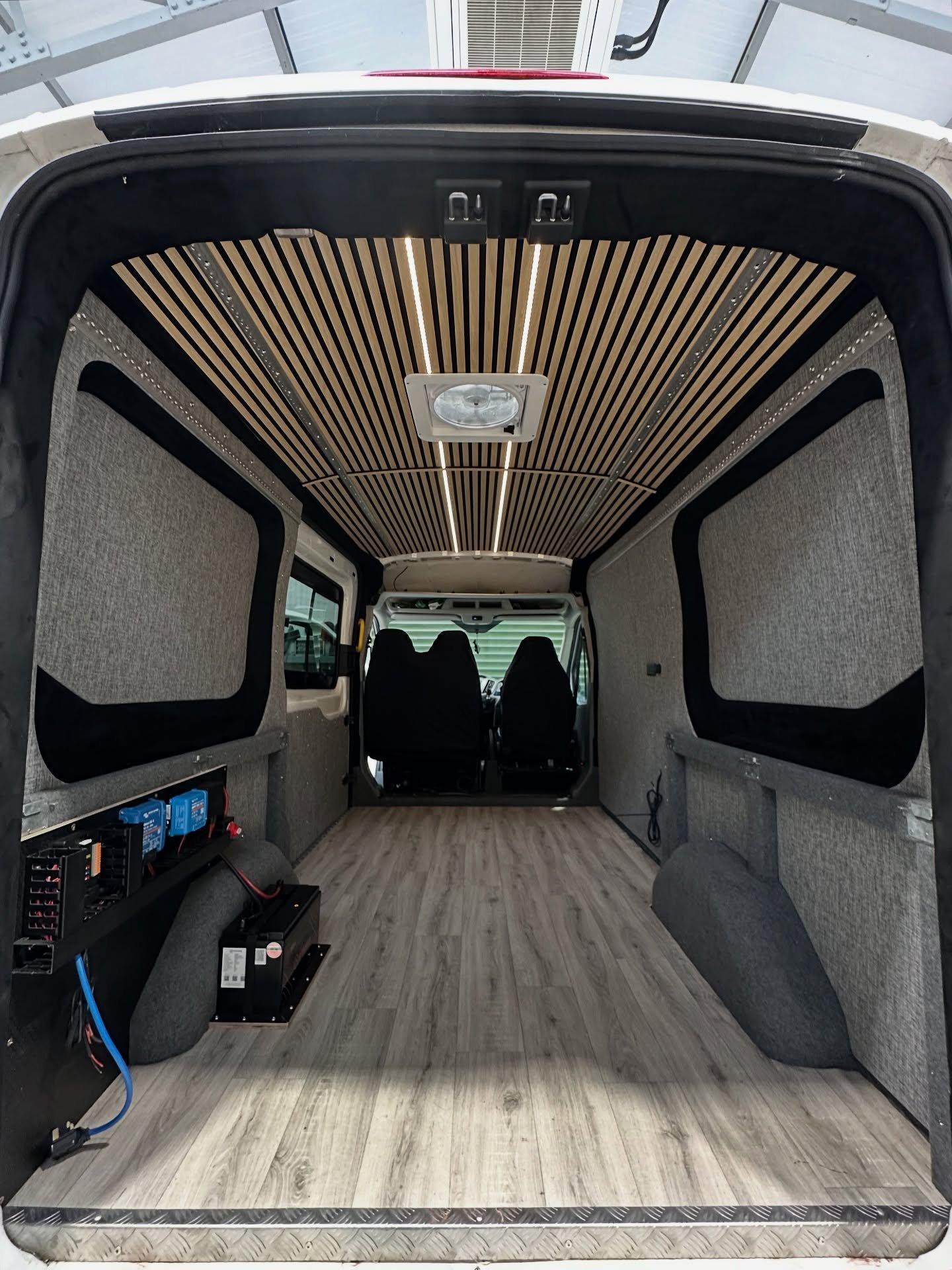 This Transit came to us for a part conversion with the basics sorted &mdash; insulation, floor and a bed frame in place. But it needed that Vinna touch.

We ply lined and trimmed with a woven jacquard material that we&rsquo;re really into, and covere