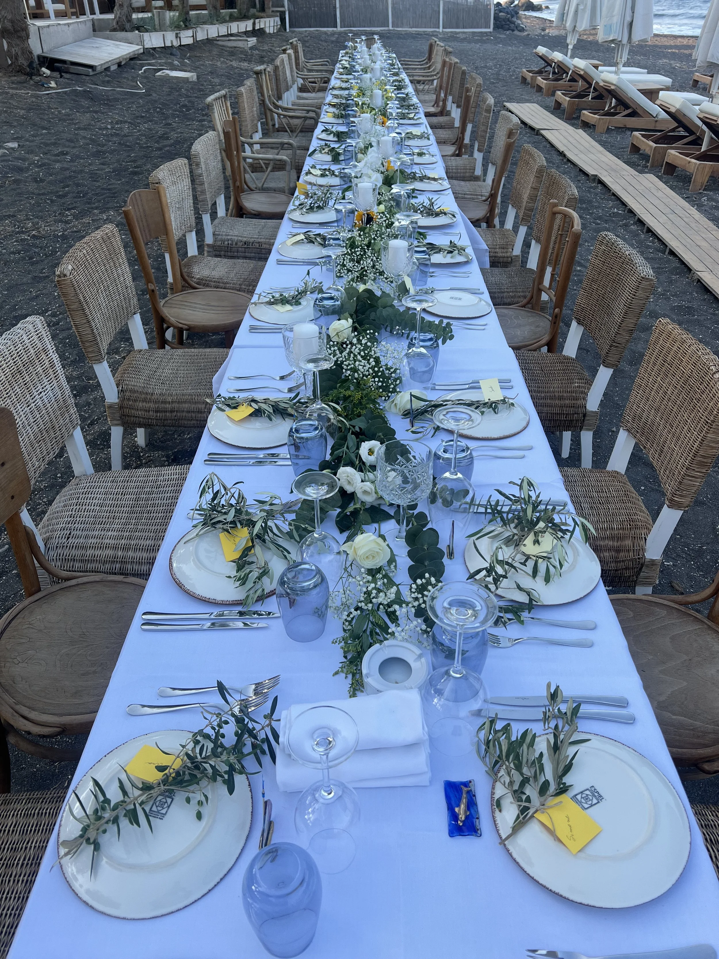 A wedding table in Mykonos ready to serve the family and guests - Orion Sirr