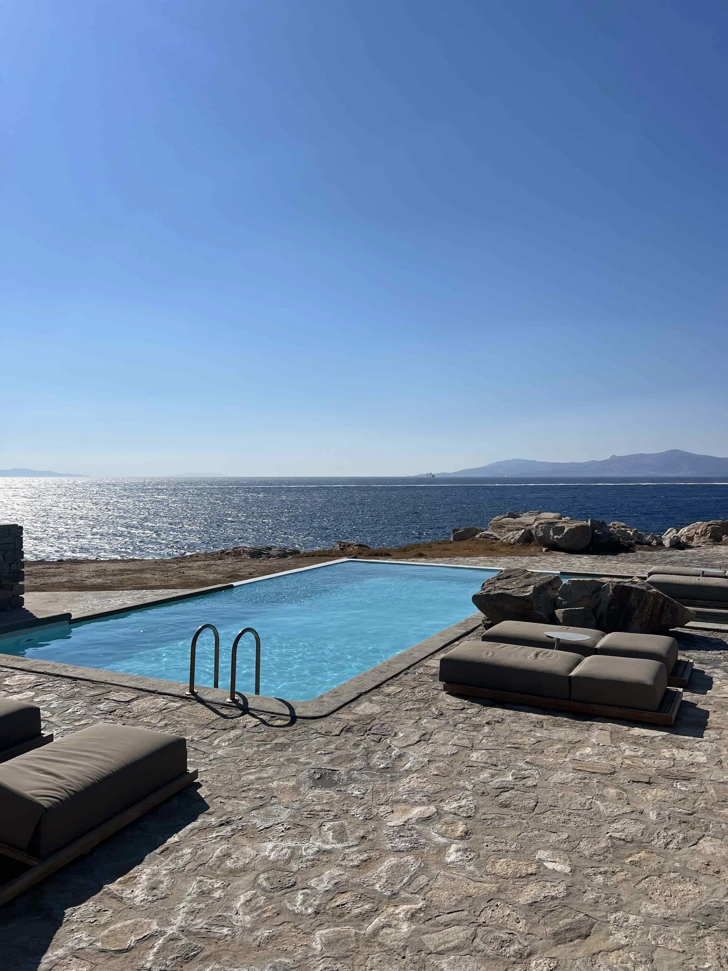 Orion Sirr Atelier filming a luxury property in Mykonos for a real estate marketing campaign