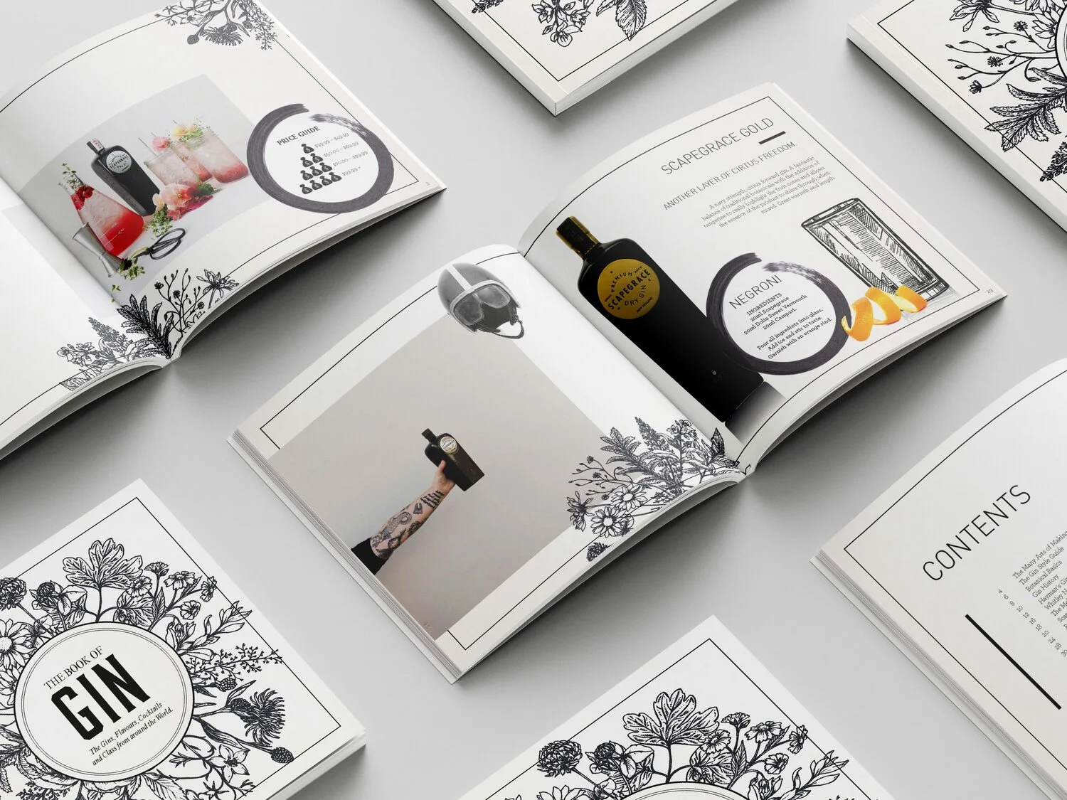 Open book with illustrations and photos about gin and cocktails, featuring bottles, flowers, and ingredients for making gin-based drinks.