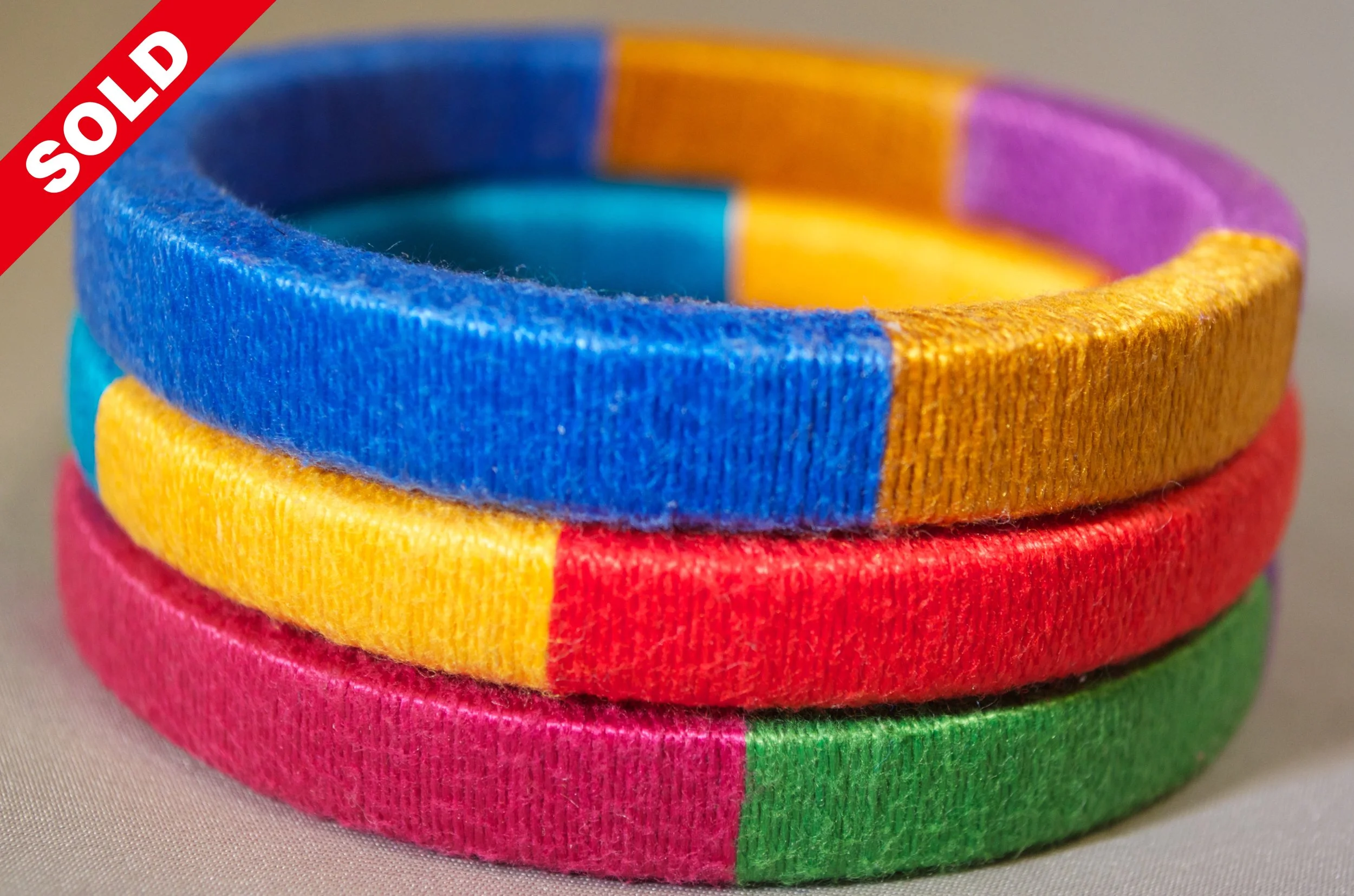 Sari Silk Wrapped Bangles: Inspired by the color, textile traditions, and visual richness of India.