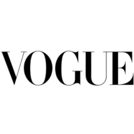 Close-up of a logo with the word 'VOGUE' in black text.