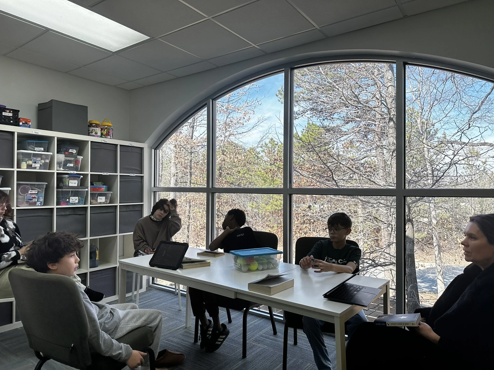 Students and staff in a Bridges Academy learning space