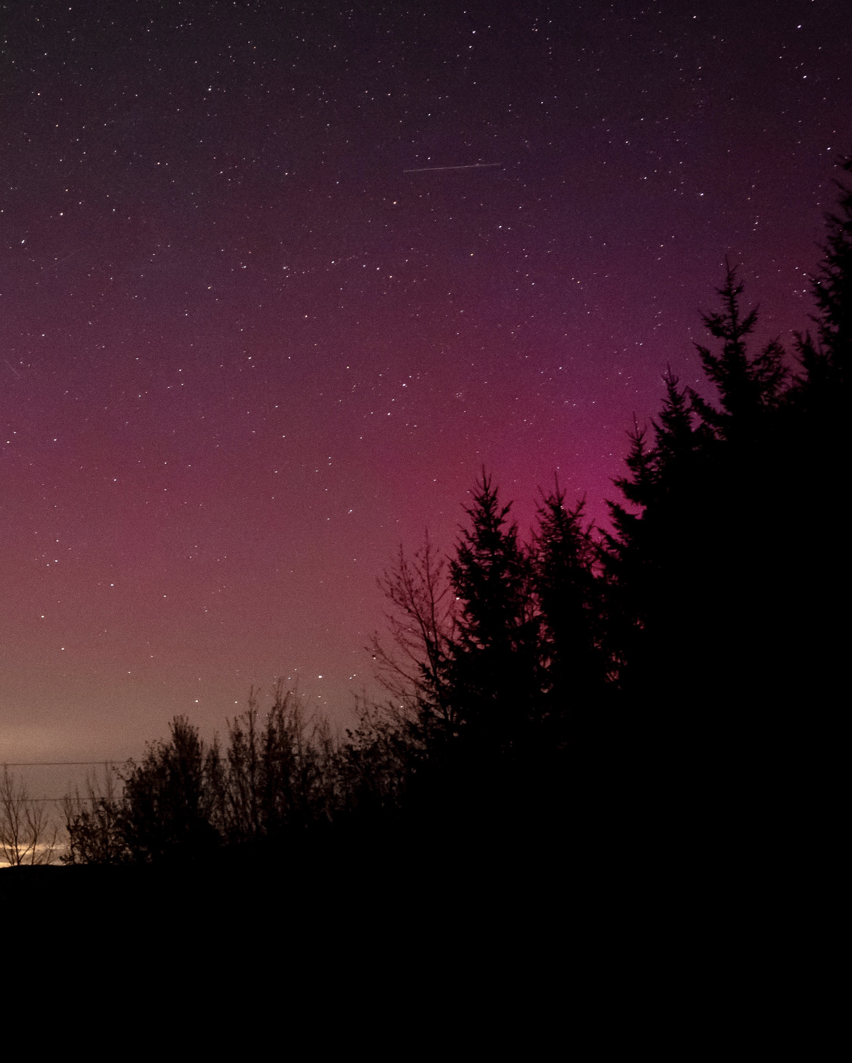 View of the Northern Lights in the Catskills at cabincabin