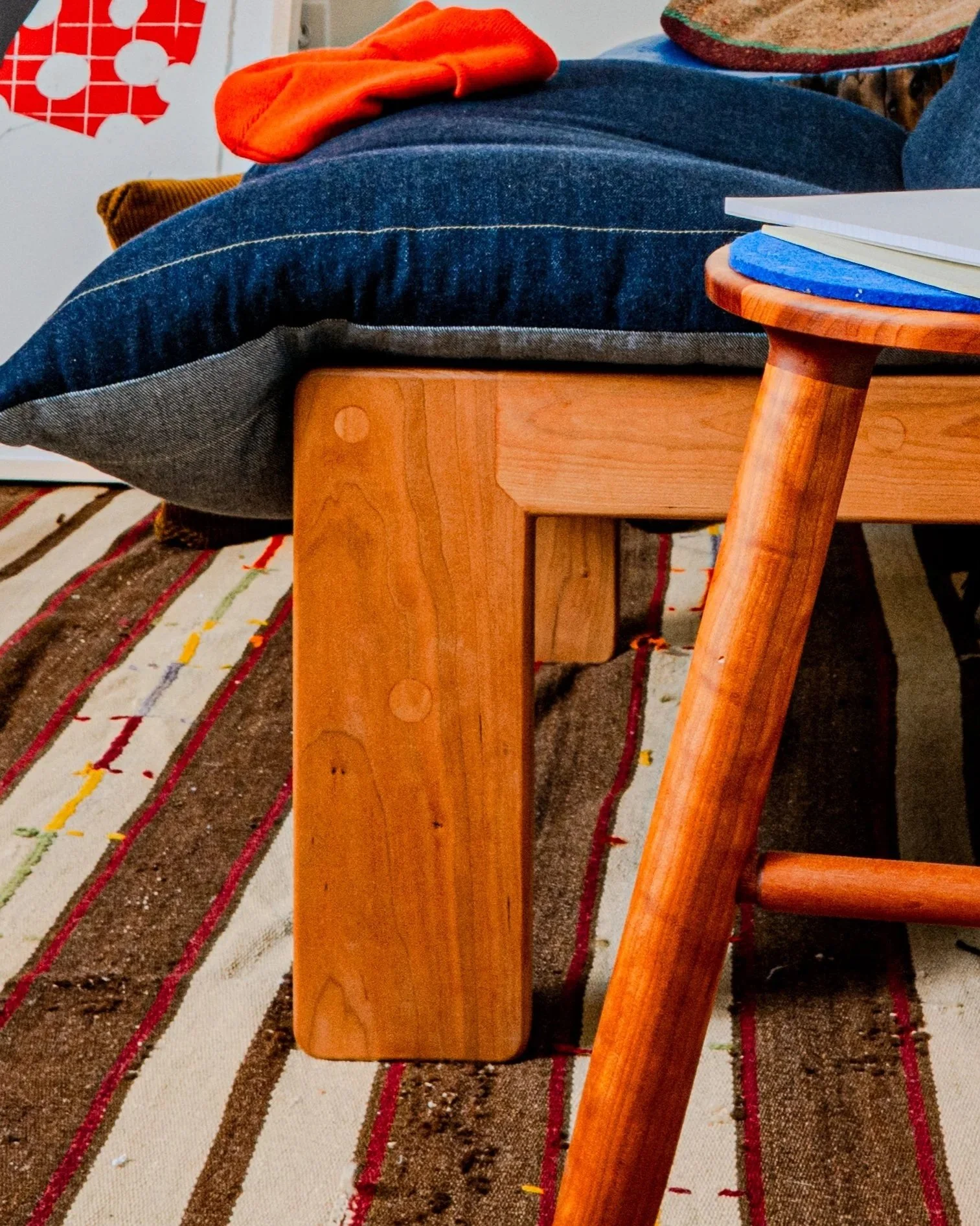 Circular and slow furniture offering featuring New Collar Goods cherry stool and modular lounge chair