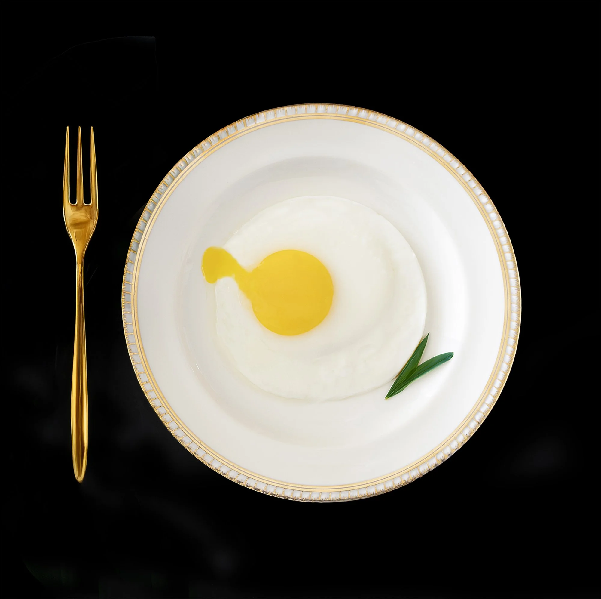 Minimalist food photograph of egg on white plate by Josh Kates