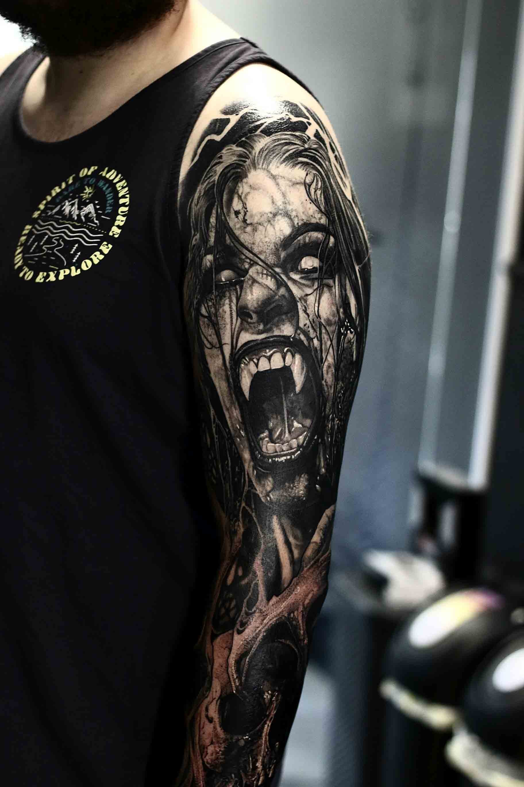 Black and grey horror style vampire tattoo by Sheffield tattoo artist Joshua Beatson