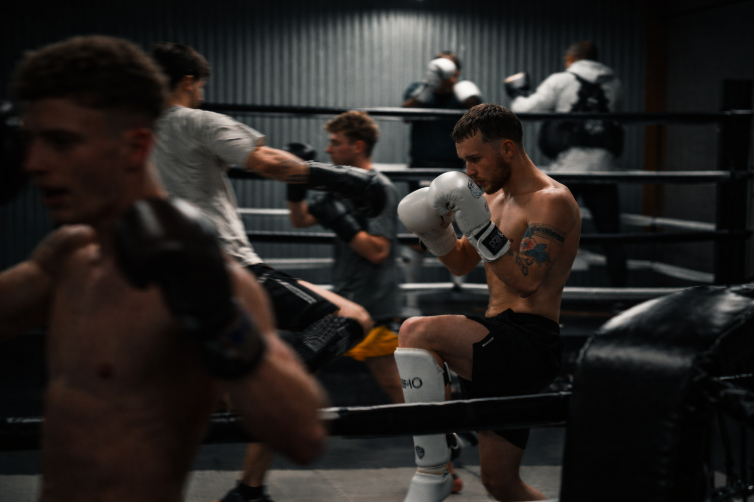 Muay Thai sparring and padwork in session at SitJaiYai gym, Worcester